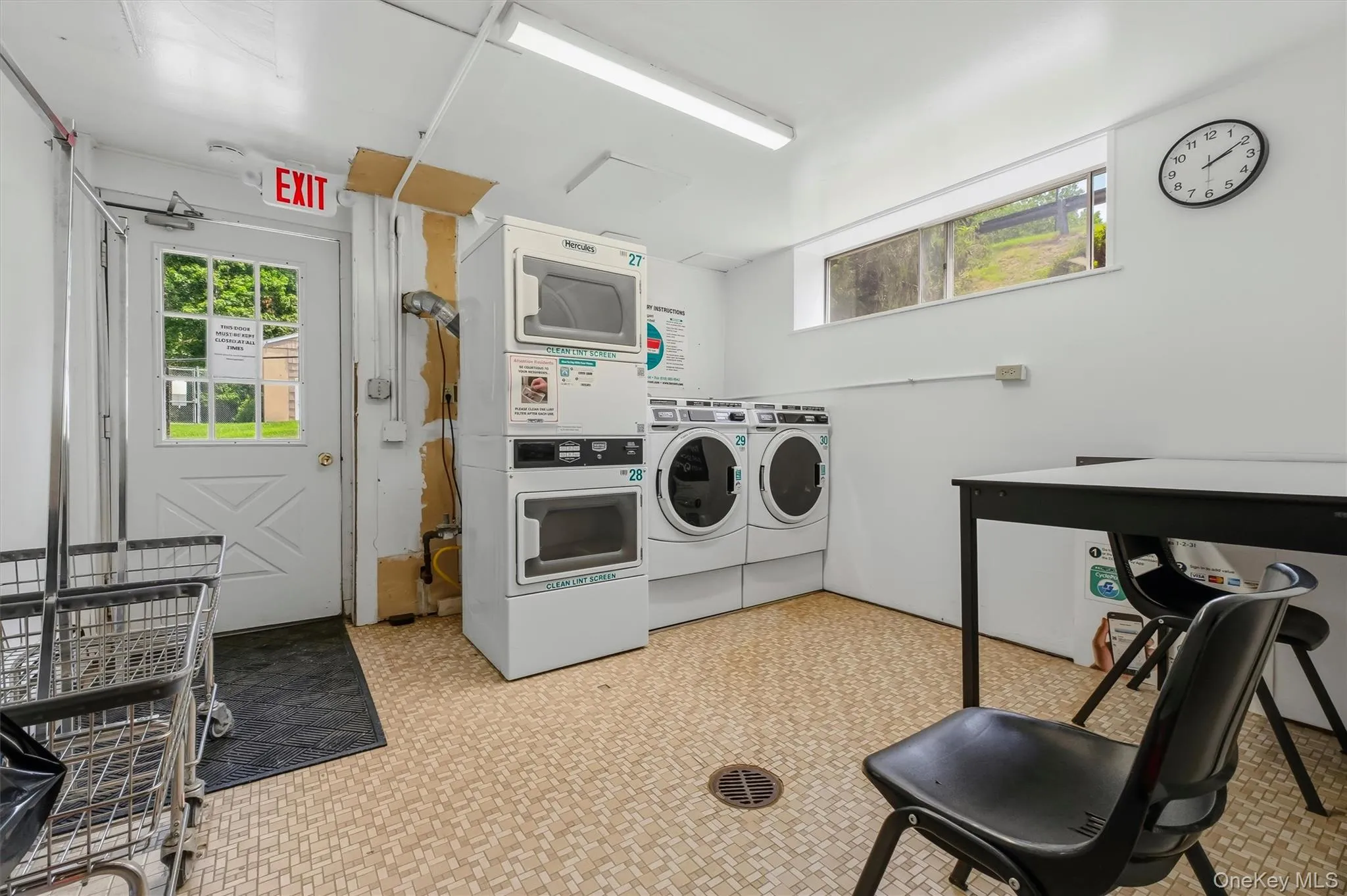 Several laundry rooms throughout the community. One is located in basement of this building. Several laundry rooms throughout the community. One is located in basement of this building.