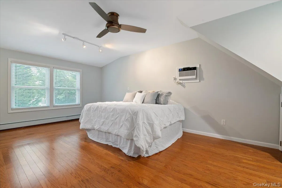 This King Sized Bed just awaits furniture in this oversized Primary Bedroom This King Sized Bed just awaits furniture in this oversized Primary Bedroom