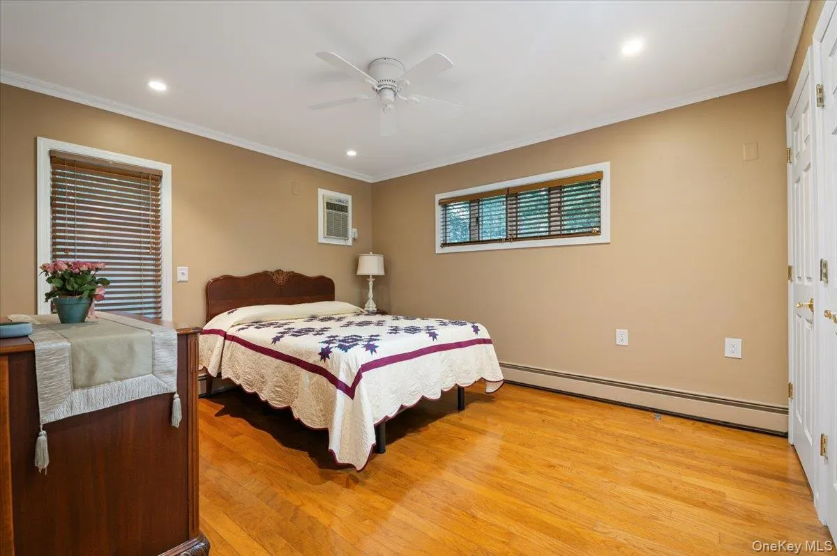 One of Two Primary Bedrooms in this Home! Main Level Primary has Triple Closets and Gleaming Hardwood Floors. One of Two Primary Bedrooms in this Home! Main Level Primary has Triple Closets and Gleaming Hardwood Floors.