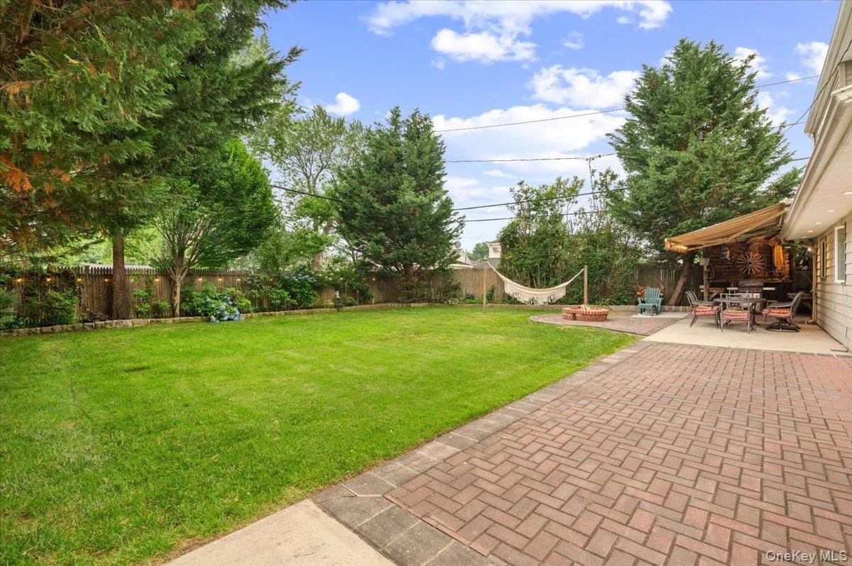Beautifully Landscaped Oversized Yard with Pavers and Concrete Patios. Beautifully Landscaped Oversized Yard with Pavers and Concrete Patios.