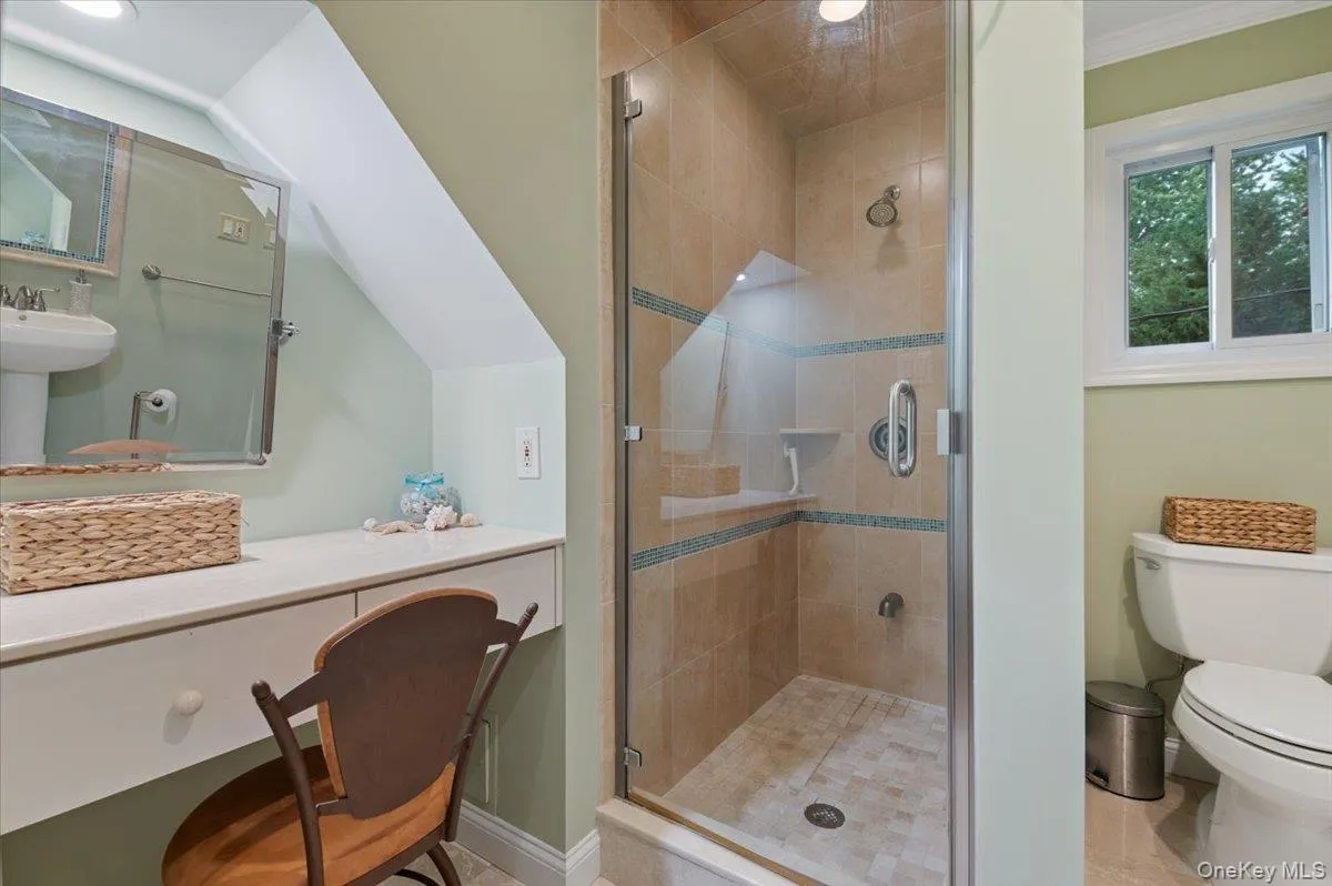 Second Floor New Bath with Frameless Glass Ceramic Shower and Dressing Area. Second Floor New Bath with Frameless Glass Ceramic Shower and Dressing Area.