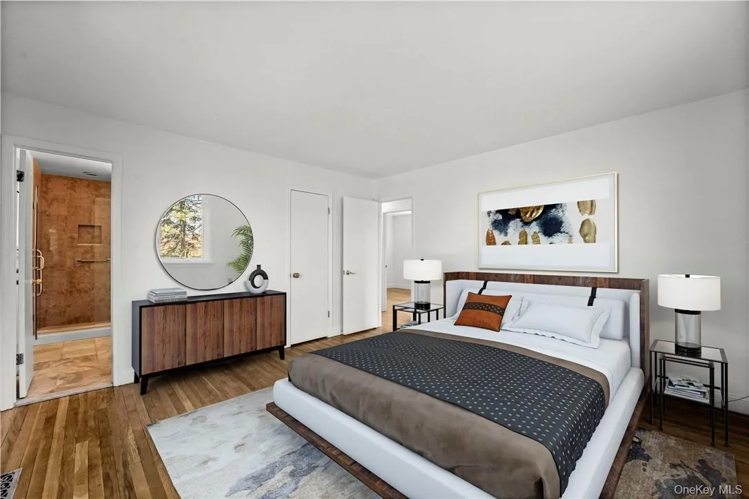 Virtually staged primary bedroom. Virtually staged primary bedroom.