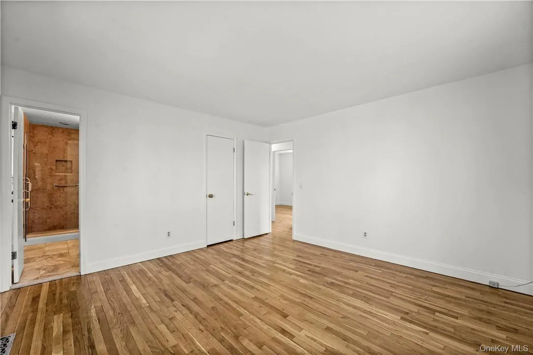 Primary Bedroom en suite with nice size shower and walk-in closet. Primary Bedroom en suite with nice size shower and walk-in closet.
