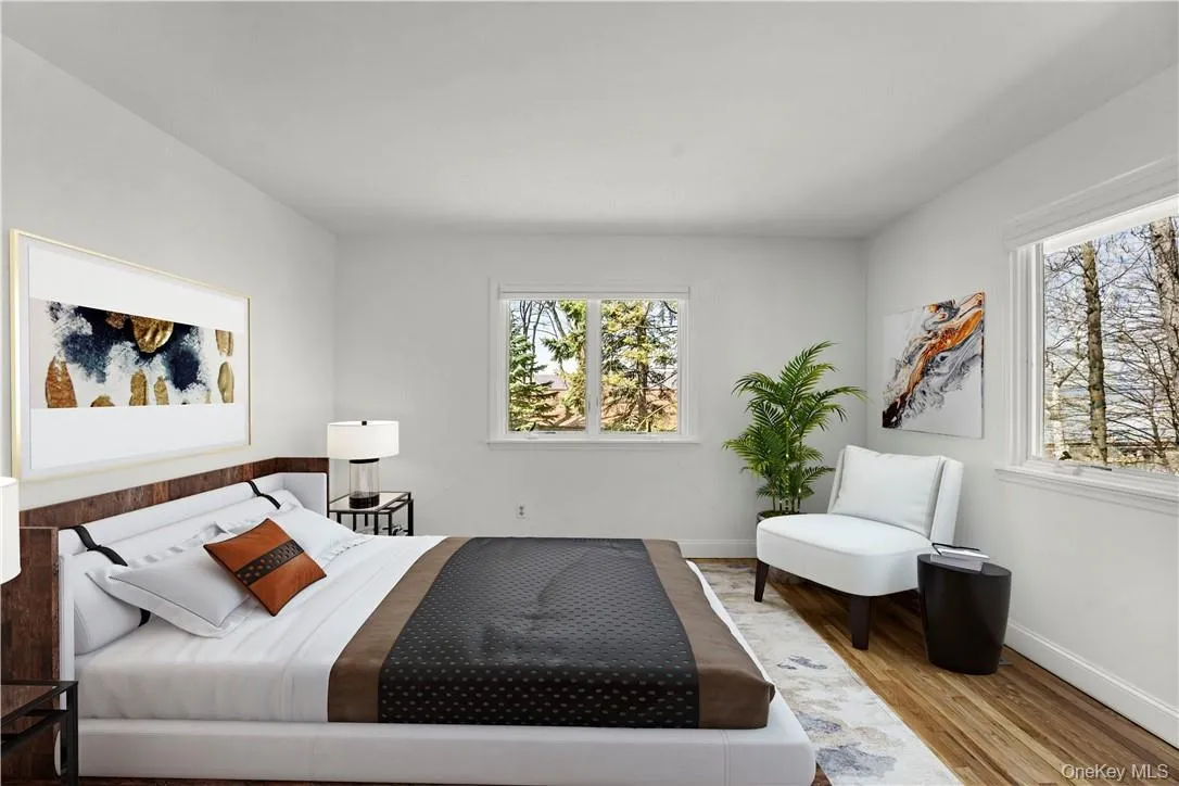 Another view of virtually staged primary bedroom. Another view of virtually staged primary bedroom.