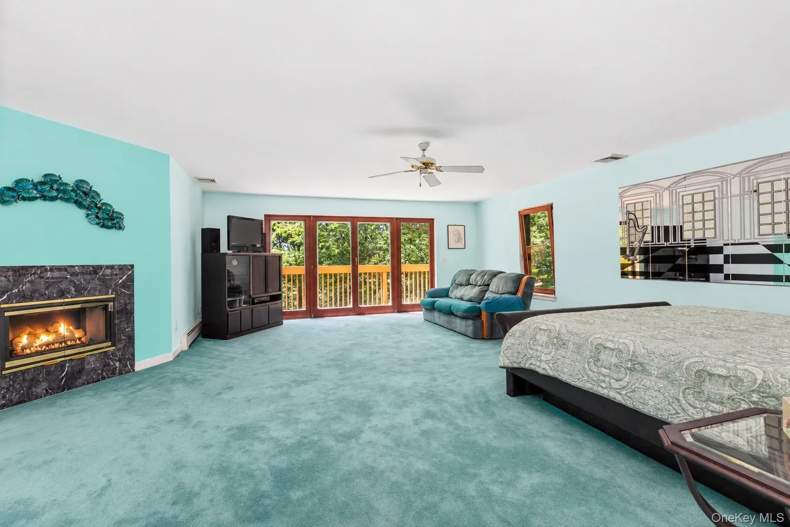 The spacious primary bedroom is privately situated upstairs, offering a peaceful and inviting retreat to relax and unwind at the end of the day. The spacious primary bedroom is privately situated upstairs, offering a peaceful and inviting retreat to relax and unwind at the end of the day.