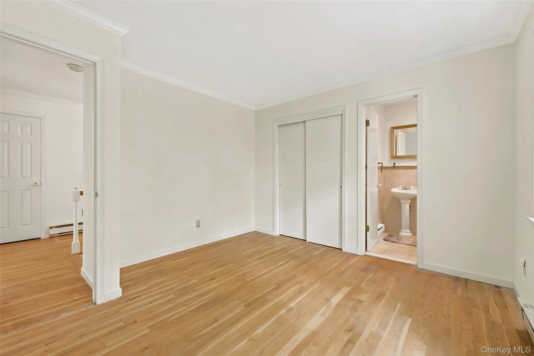 Bedroom w/ ensuite half bath Bedroom w/ ensuite half bath