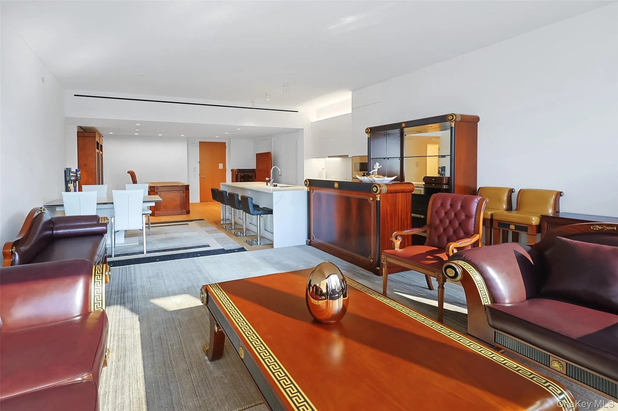 Open-concept living space featuring wood-finish flooring, From Kitchen and Living Room Open-concept living space featuring wood-finish flooring, From Kitchen and Living Room