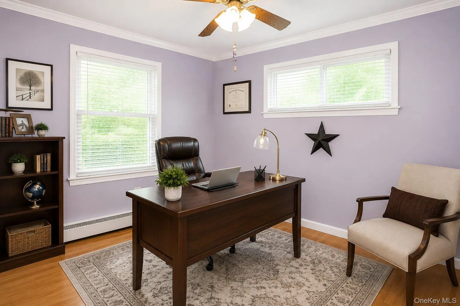 Spacious room featuring multiple windows with blinds, light wood-finish flooring, and a ceiling fan. AI Staged Spacious room featuring multiple windows with blinds, light wood-finish flooring, and a ceiling fan. AI Staged