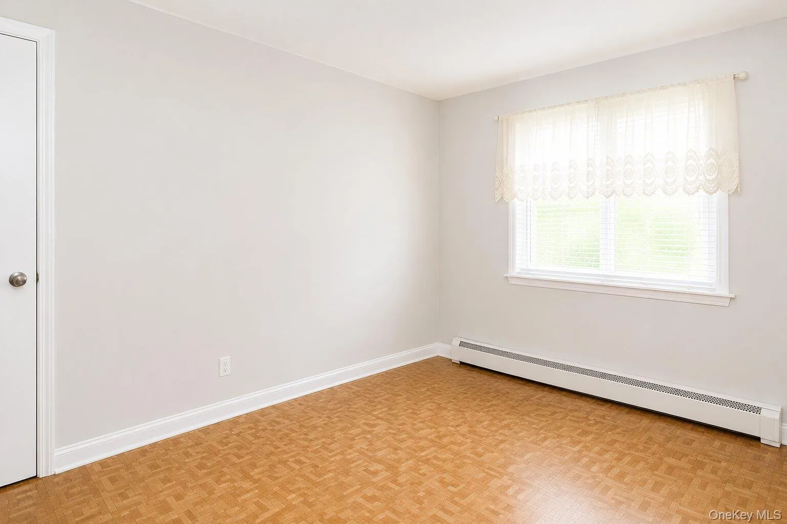 Bright interior with patterned wood-finish flooring Bright interior with patterned wood-finish flooring