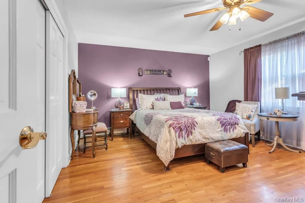 Large, light-filled primary bedroom with a spacious closet. Large, light-filled primary bedroom with a spacious closet.