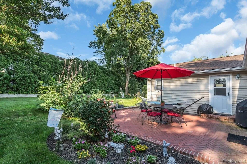 Backyard oasis with a private patio off the kitchen. Backyard oasis with a private patio off the kitchen.