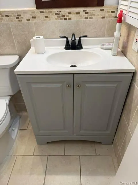 Full bath with updated flooring, tile and vanity. Full bath with updated flooring, tile and vanity.