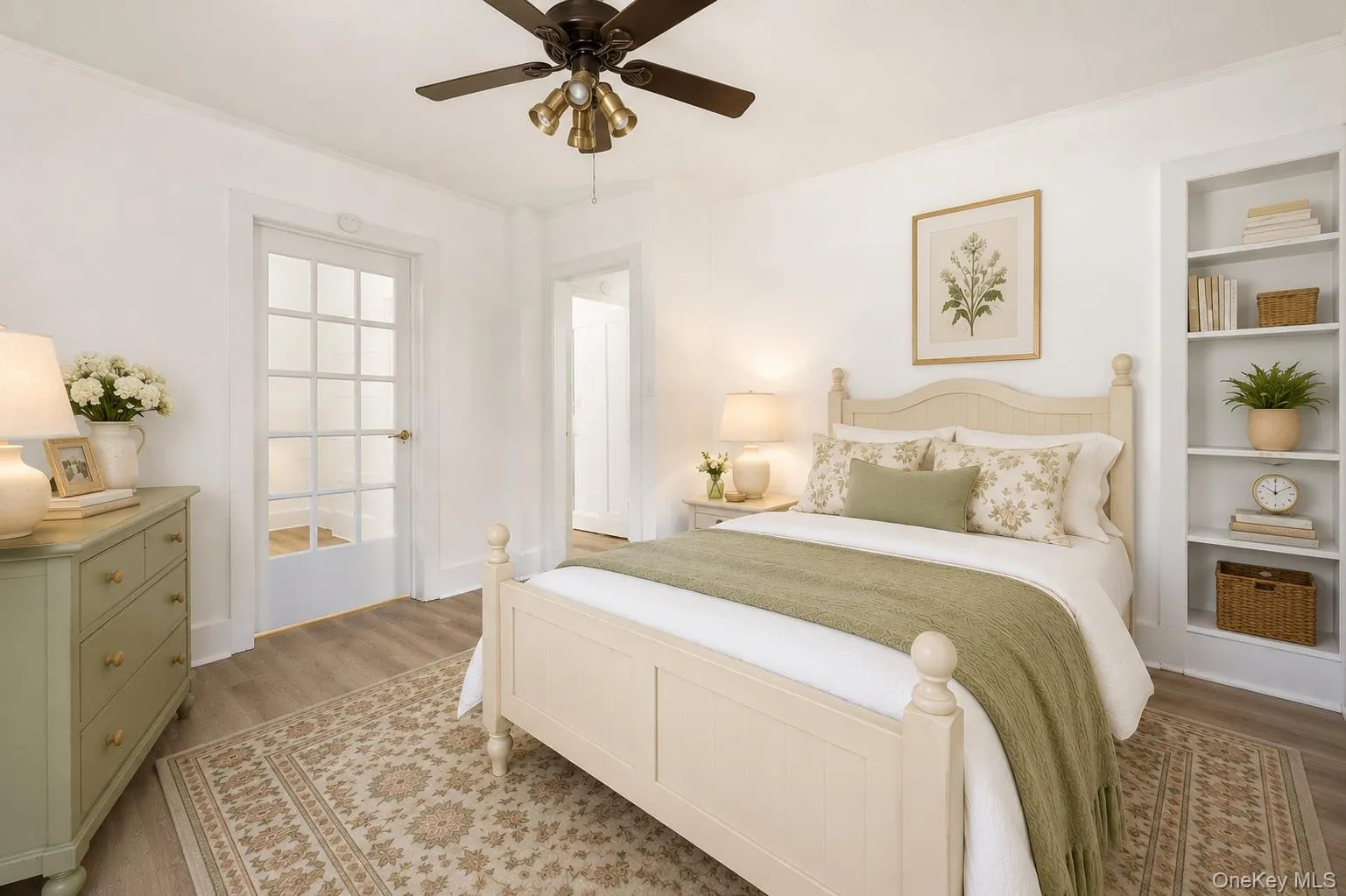Virtually Staged. The main bedroom gets plenty of light, features built-in shelving and beautiful new floors. Virtually Staged. The main bedroom gets plenty of light, features built-in shelving and beautiful new floors.