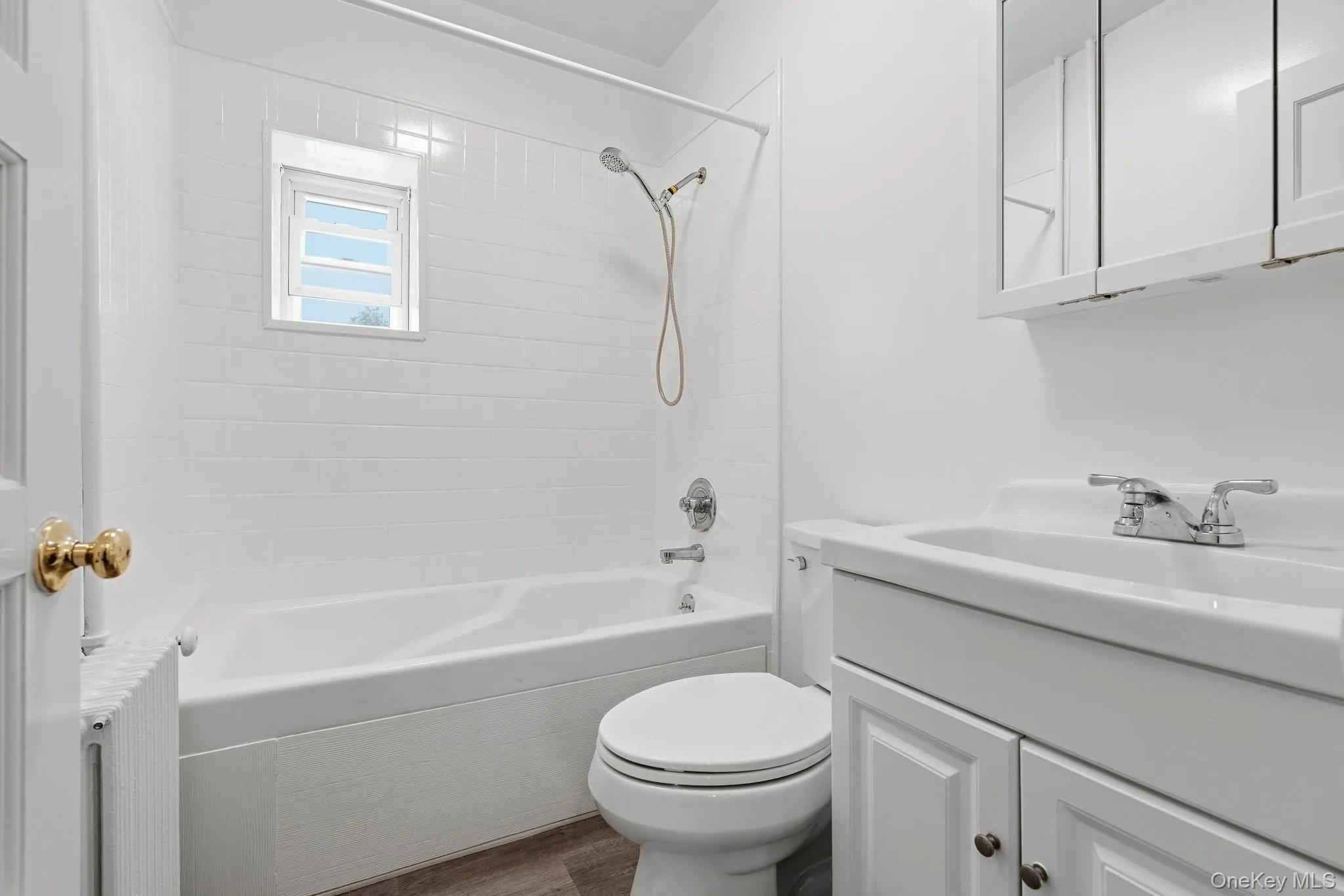 This light and bright bathroom is a lovely oasis to wind away the day. This light and bright bathroom is a lovely oasis to wind away the day.