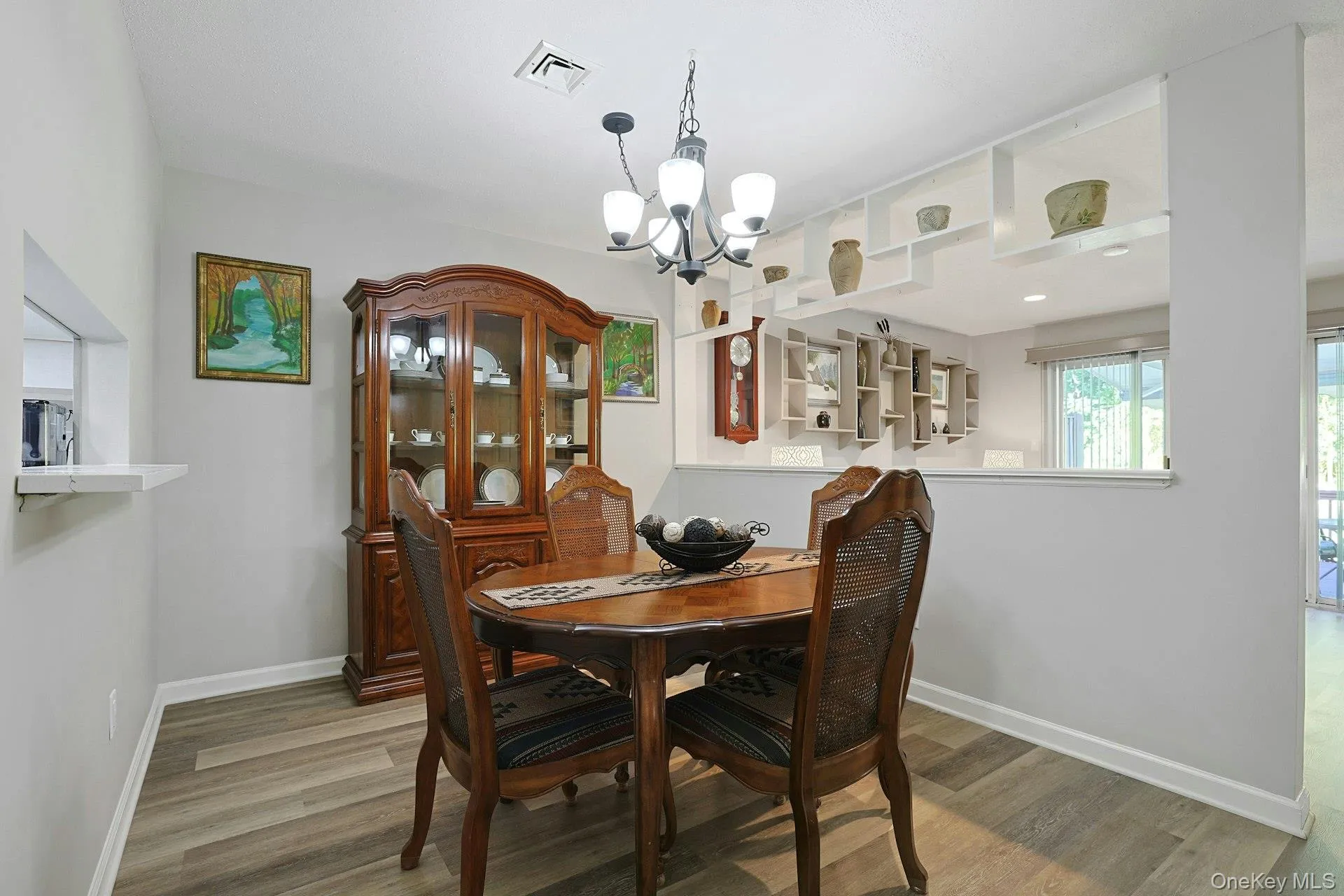 another view of the formal dining room open to the living room another view of the formal dining room open to the living room