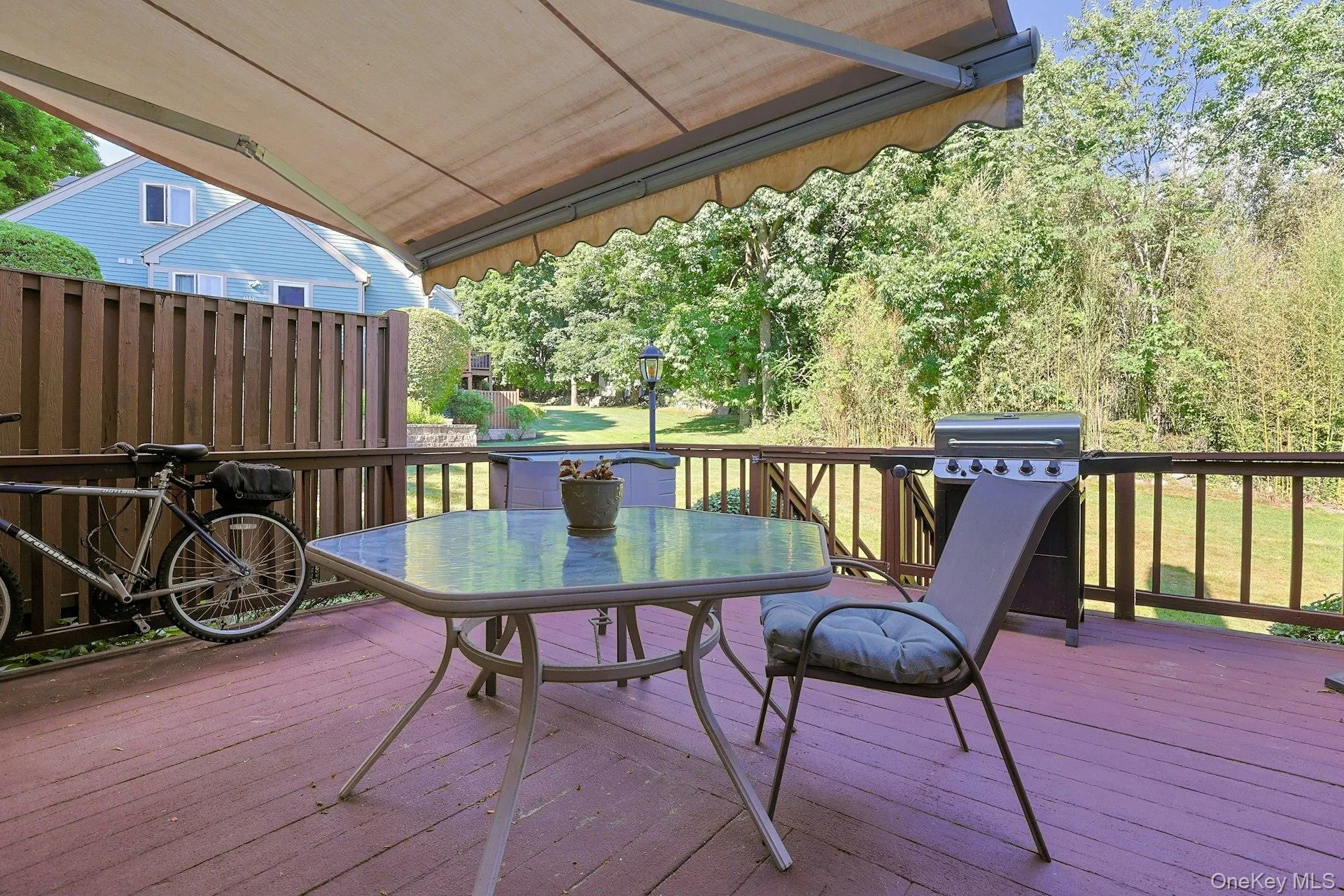 this oversized 16 x 16 deck with an electric awning provides additional entertaining space, which overlooks the peaceful backyard this oversized 16 x 16 deck with an electric awning provides additional entertaining space, which overlooks the peaceful backyard