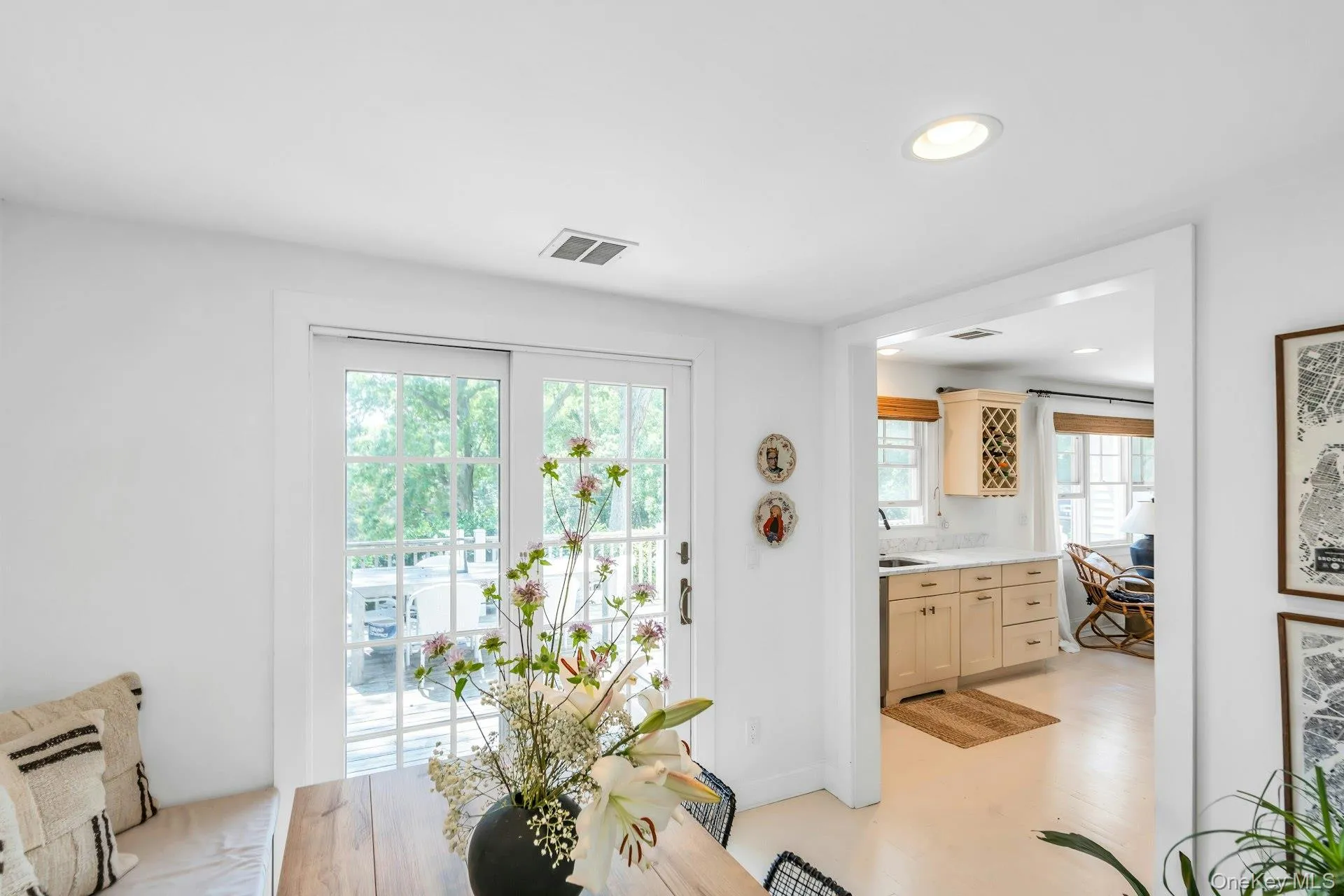 Dining area with frech doors leading to deck and backyard Dining area with frech doors leading to deck and backyard