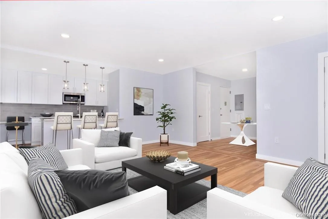 Living room opens to kitchenvirtually staged Living room opens to kitchenvirtually staged