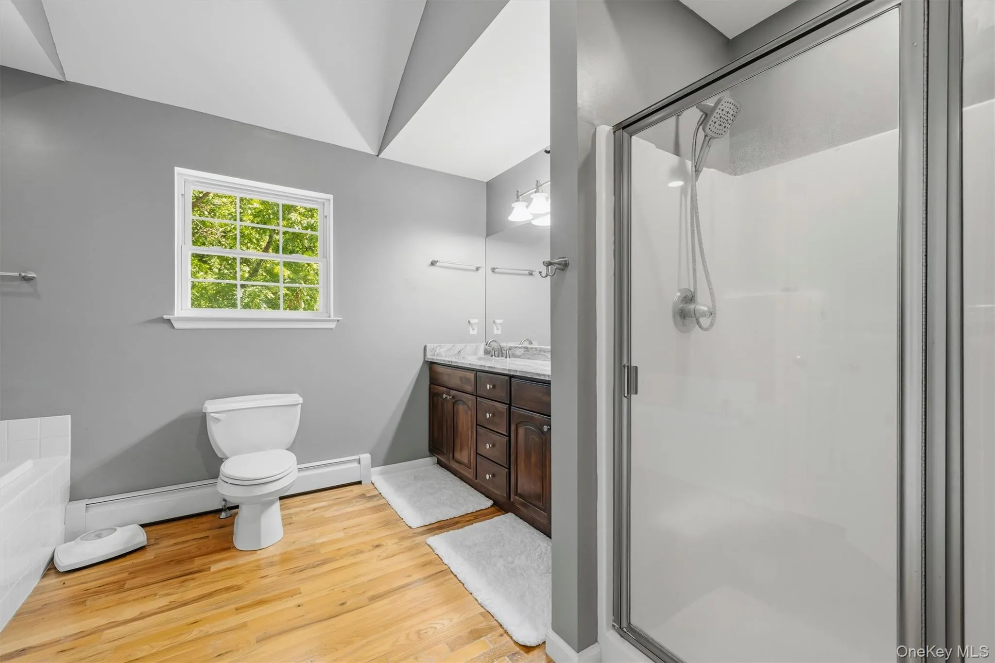 Master bath with stand up shower and double vanities. Master bath with stand up shower and double vanities.