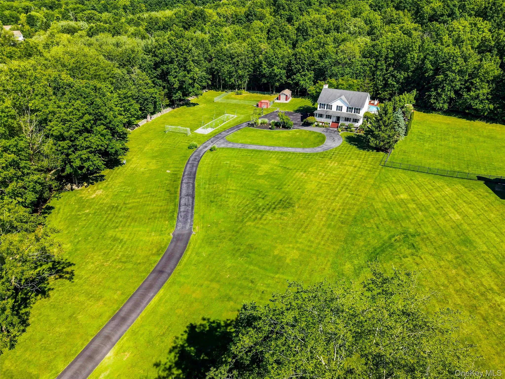 Sky view of property, front. Sky view of property, front.