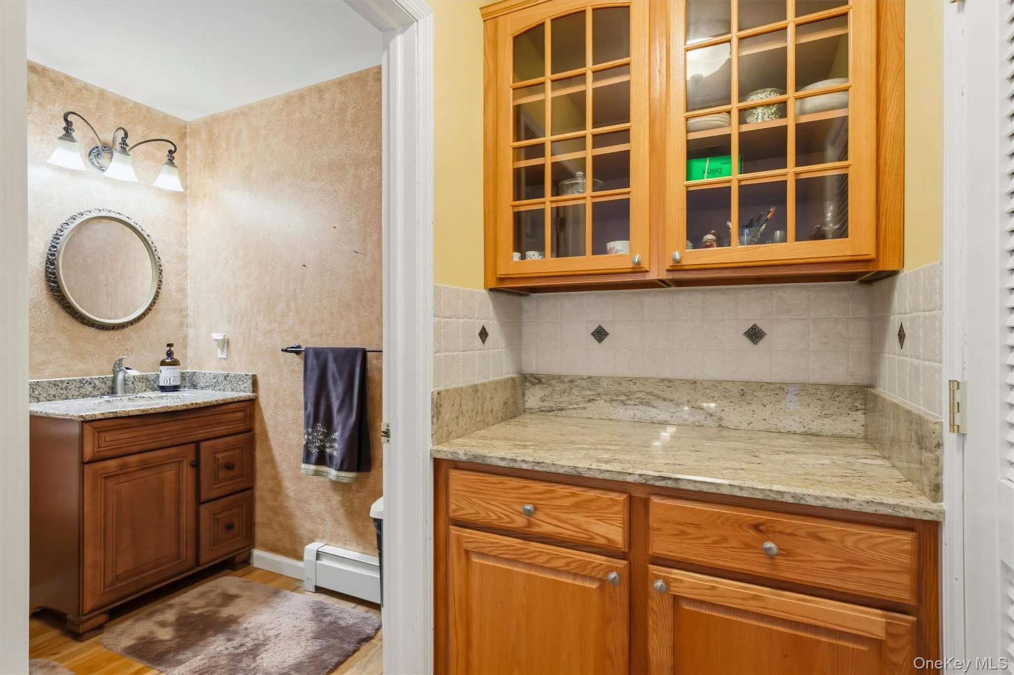 Lavatory at end of kitchen hallway. Lavatory at end of kitchen hallway.