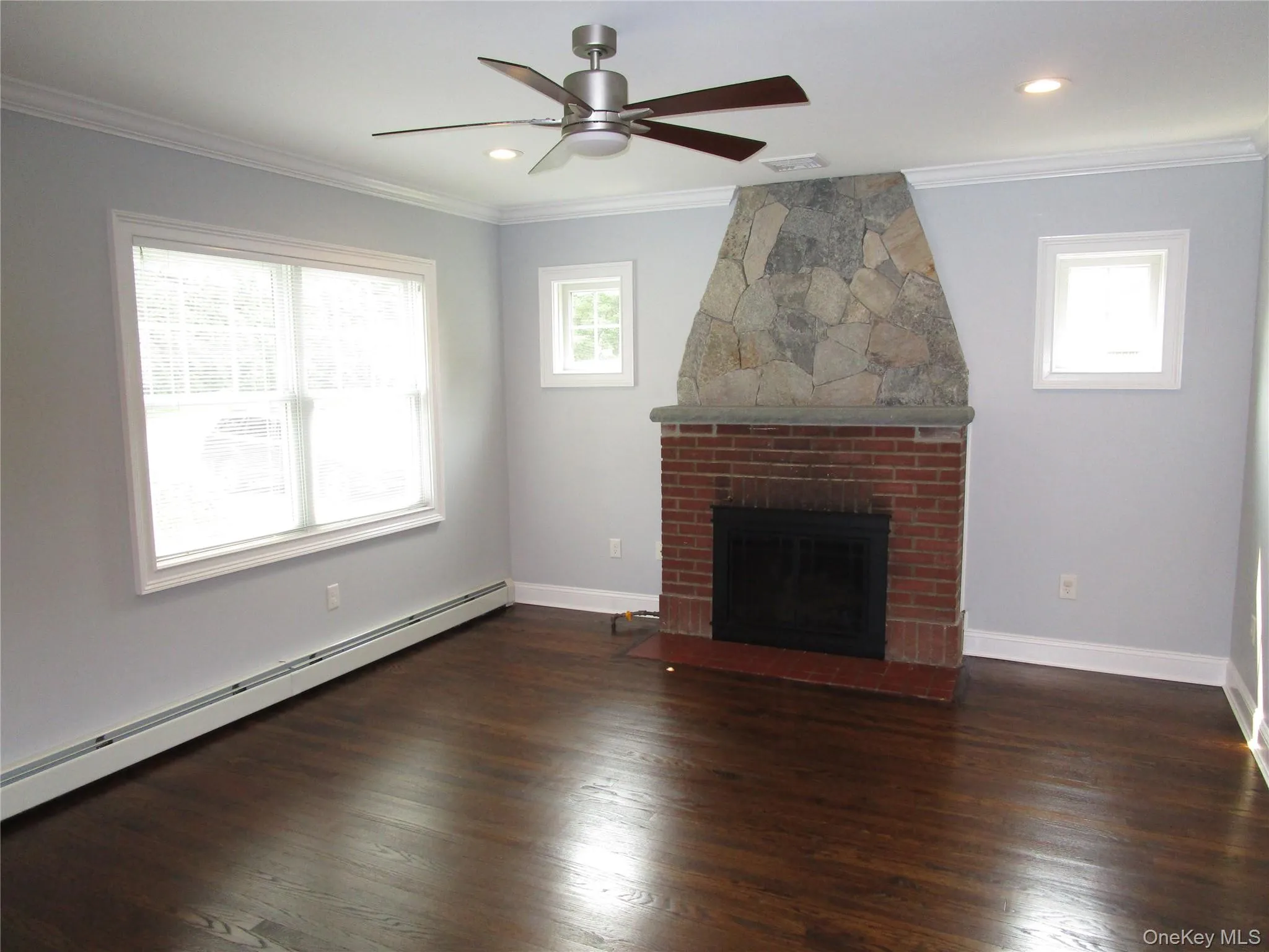 Living room w/fireplace & hardwood floors Living room w/fireplace & hardwood floors