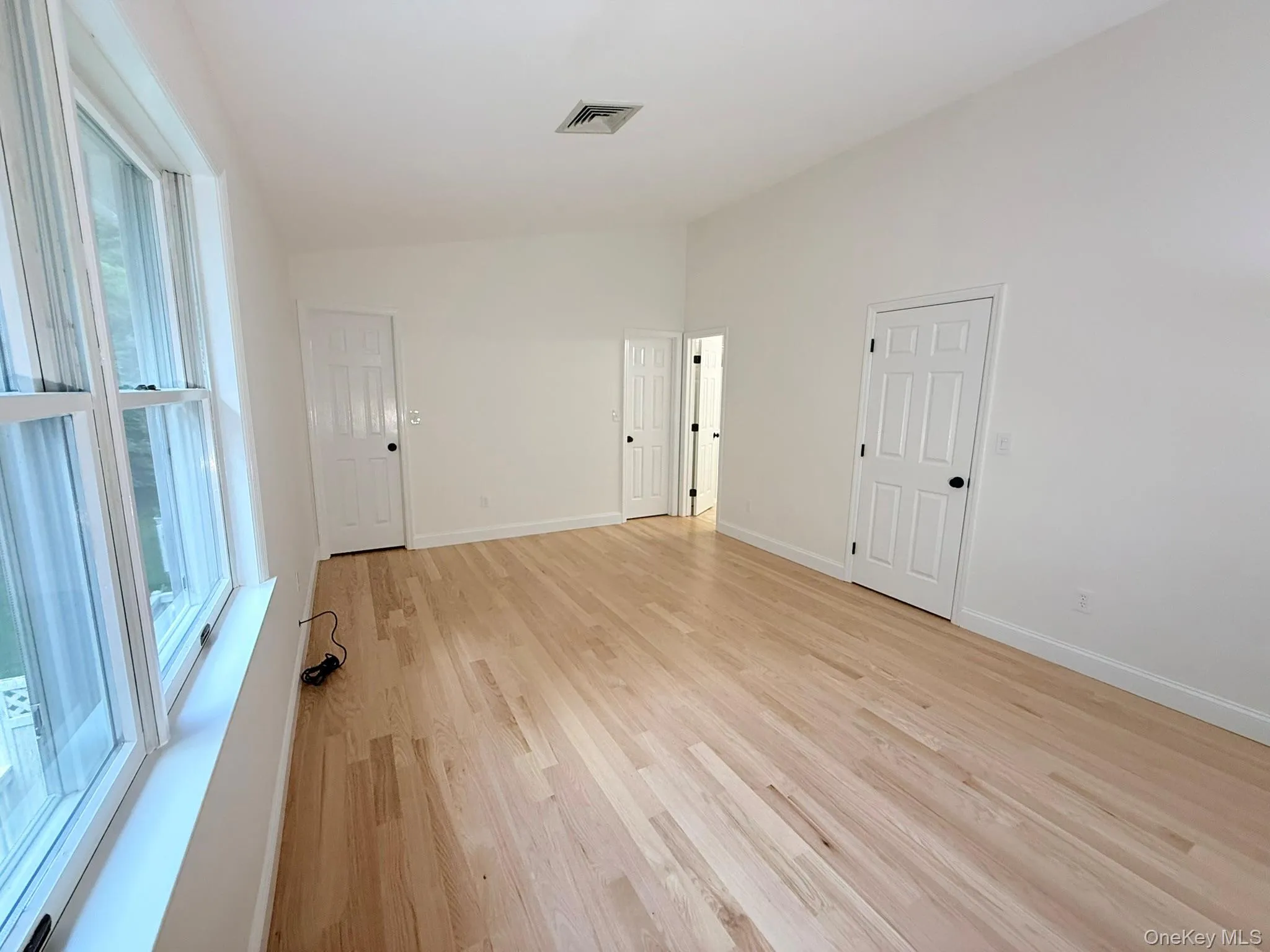The primary bedroom featuring generous closet space for added convenience. The primary bedroom featuring generous closet space for added convenience.