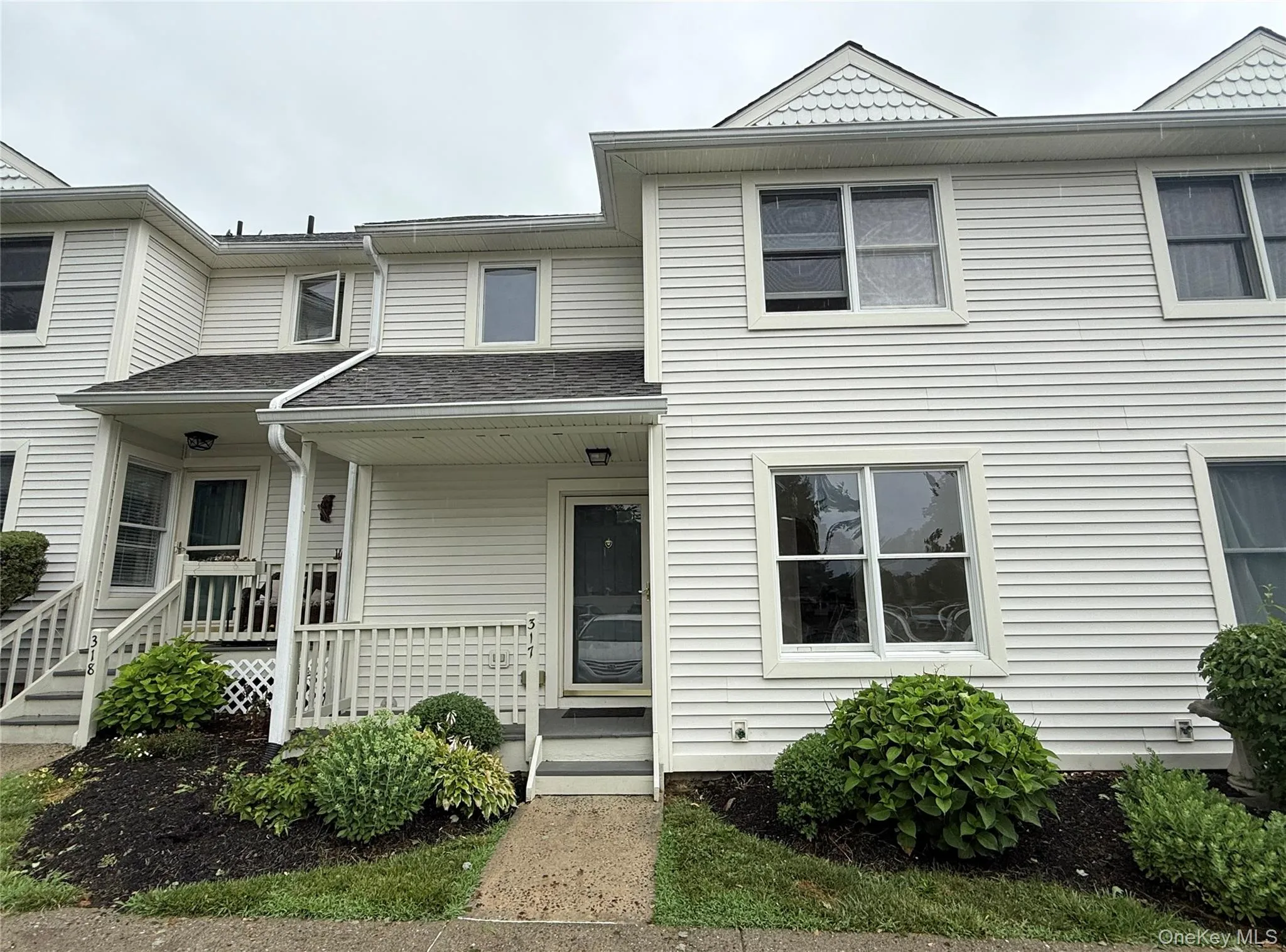 The front entrance offers a charming welcome to this tri-level townhouse. The front entrance offers a charming welcome to this tri-level townhouse.