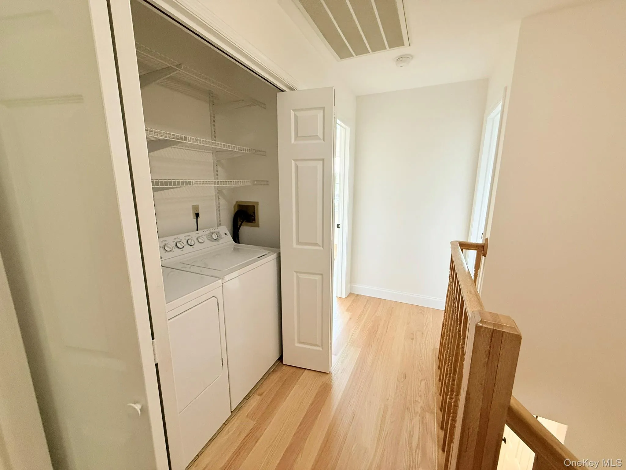 Conveniently located hallway laundry area with washer and dryer on the same level as the bedrooms. Conveniently located hallway laundry area with washer and dryer on the same level as the bedrooms.