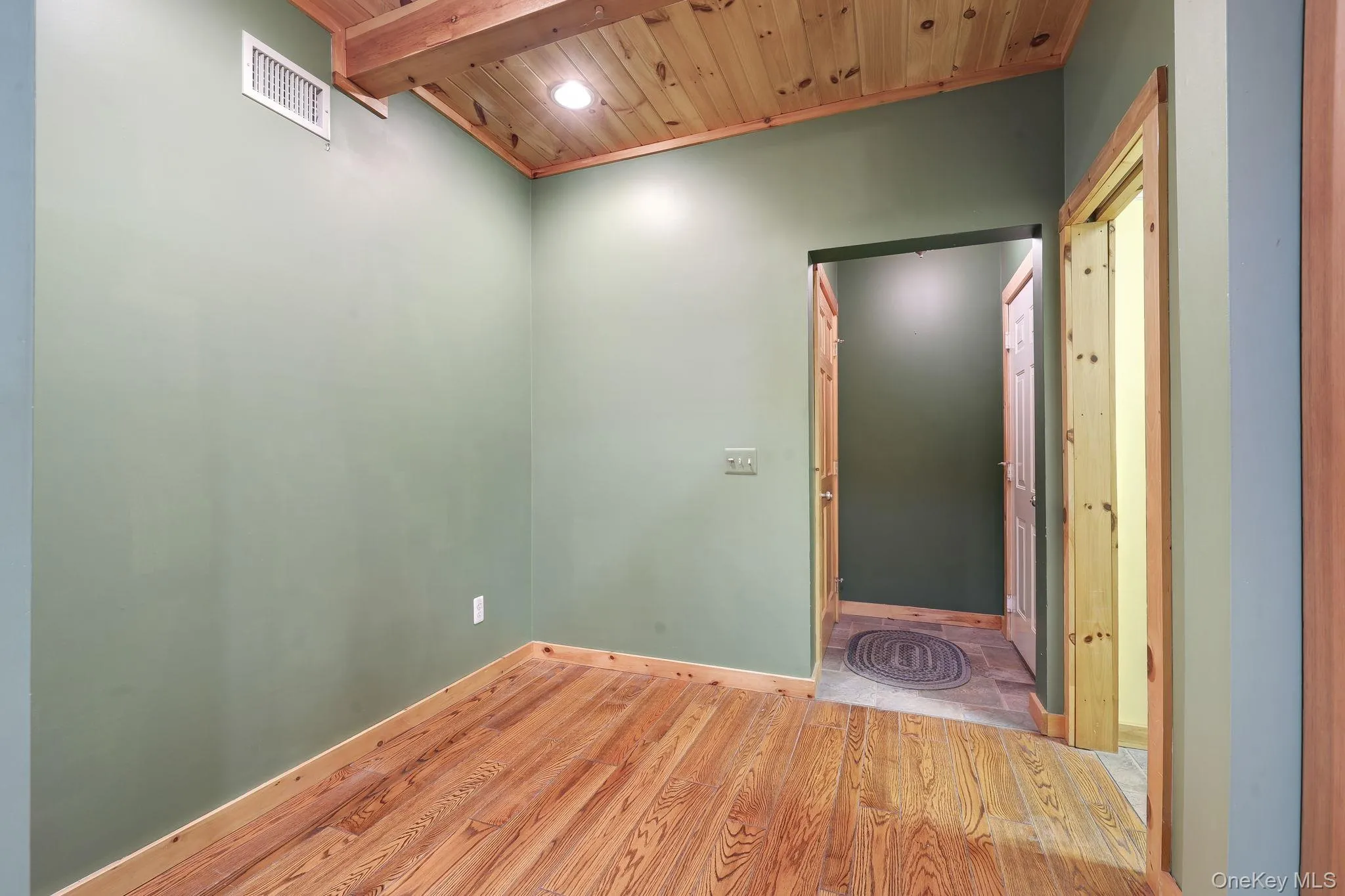 This alcove was utilized as a home office. It's just off the kitchen and opposite the first floor laundry room. This alcove was utilized as a home office. It's just off the kitchen and opposite the first floor laundry room.
