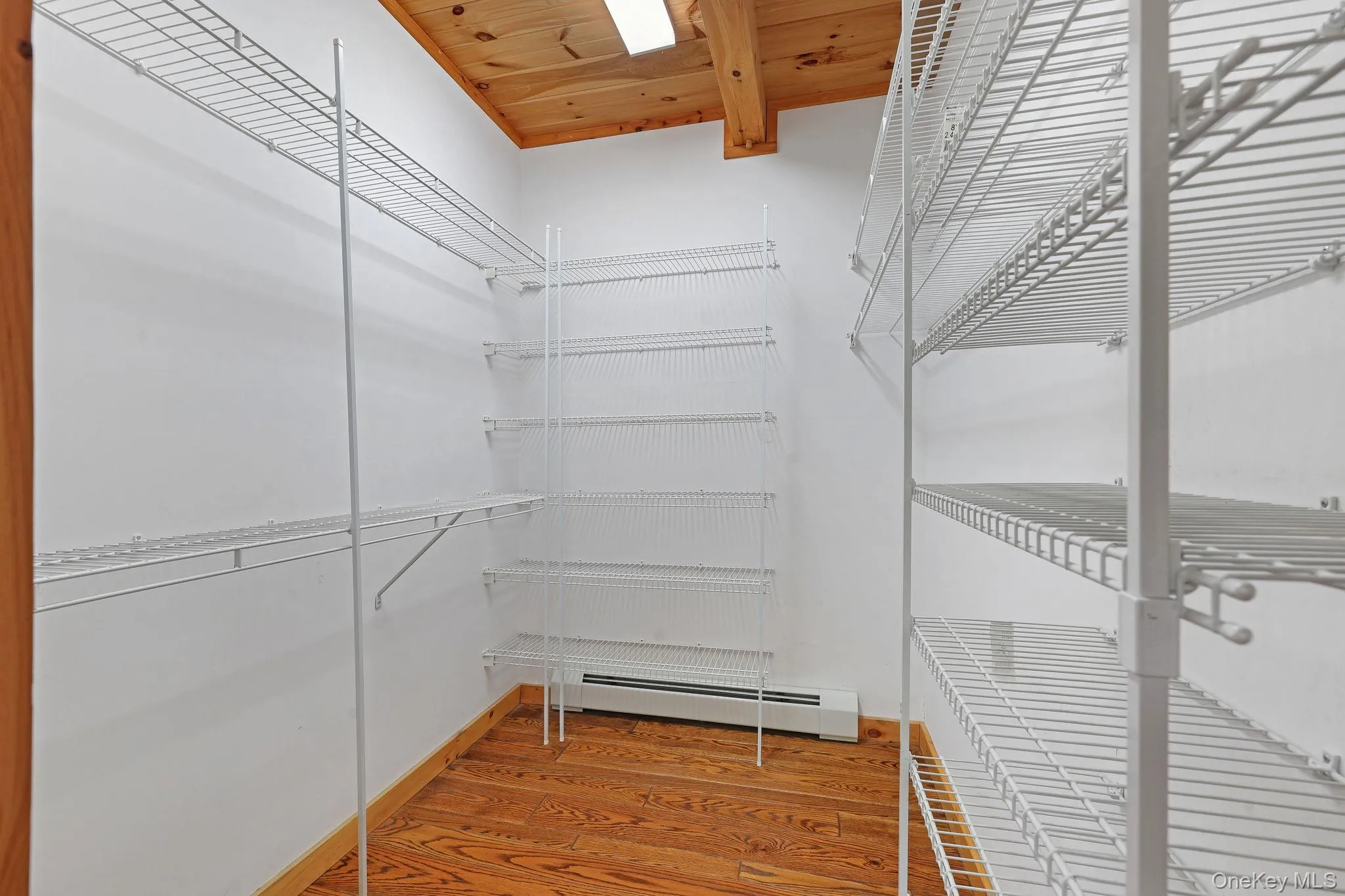 Primary bedroom closet. Primary bedroom closet.