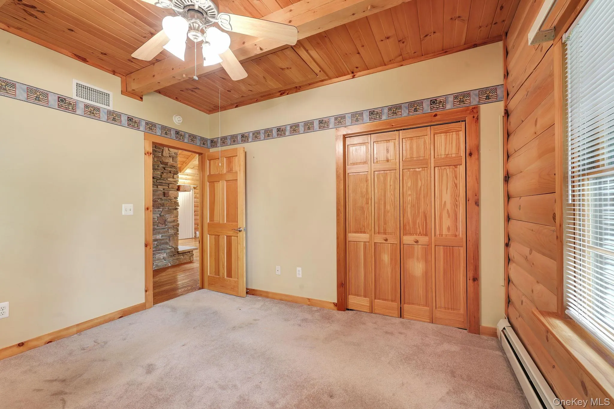 Alternate view of the bedroom shows the double door closet and the ceiling light/fan. Alternate view of the bedroom shows the double door closet and the ceiling light/fan.