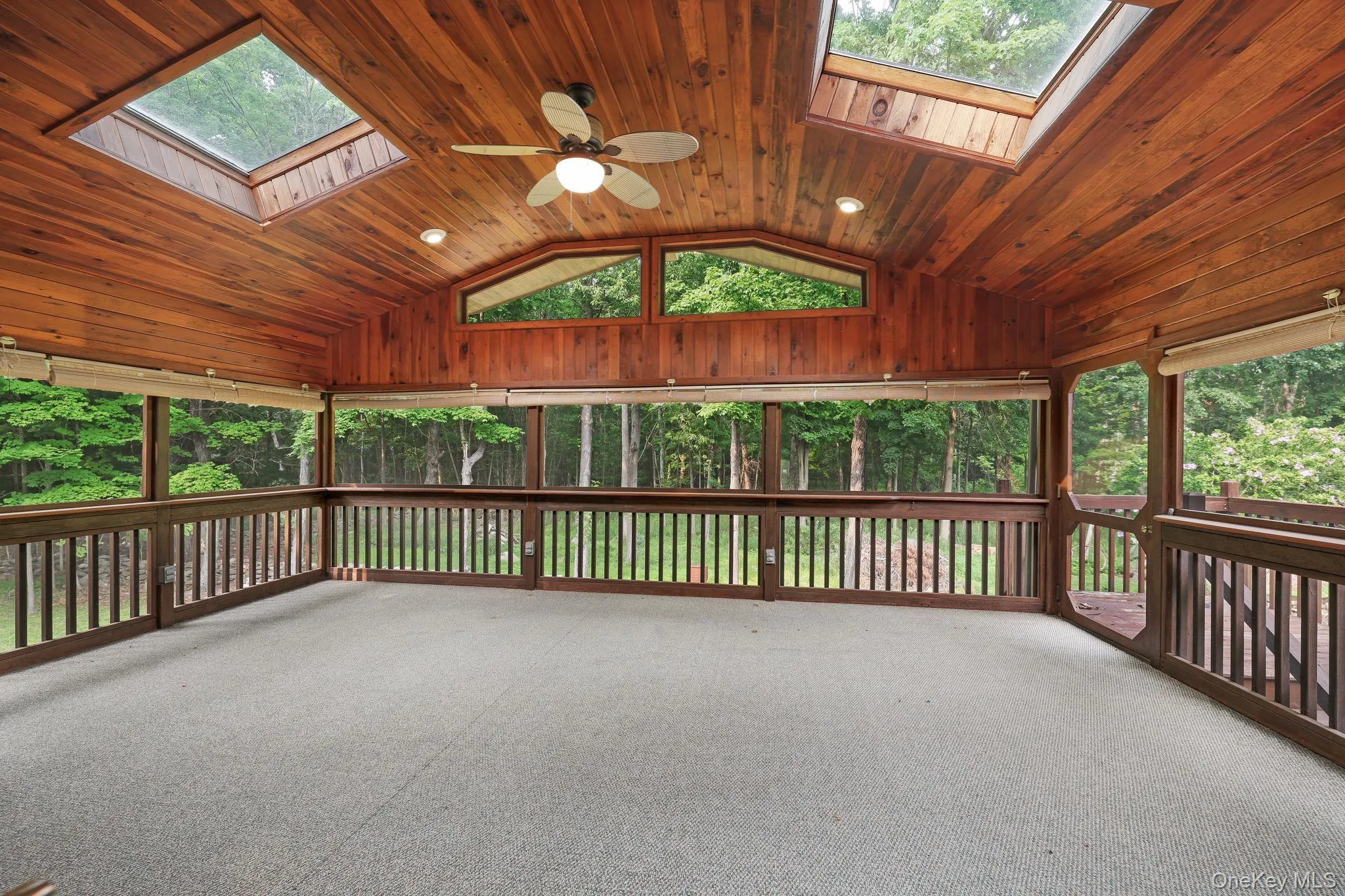Covered screened porch with a great view of th yard. Covered screened porch with a great view of th yard.