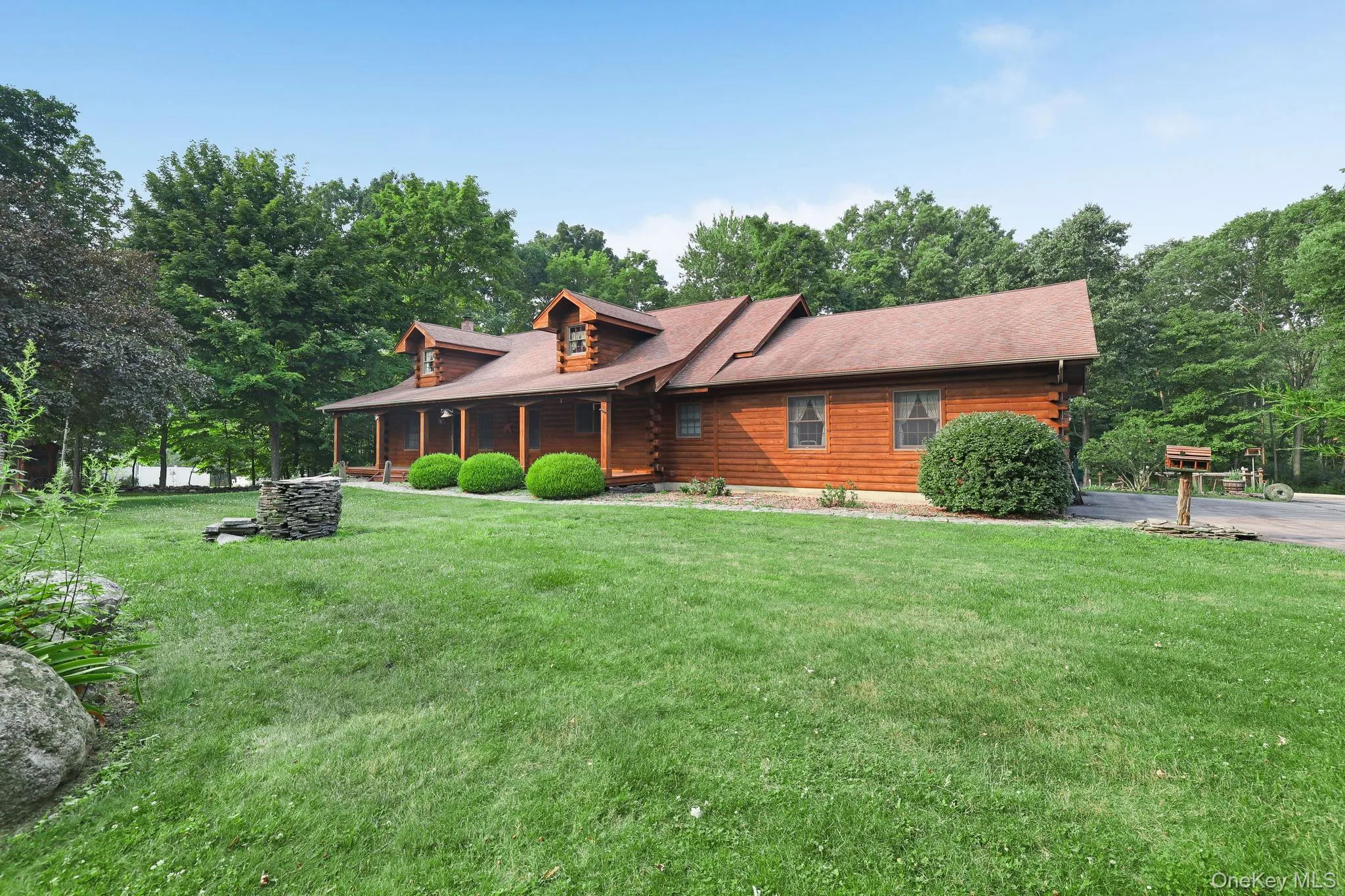 There's an attached two car garage for your vehicles and a paved driveway. There's an attached two car garage for your vehicles and a paved driveway.