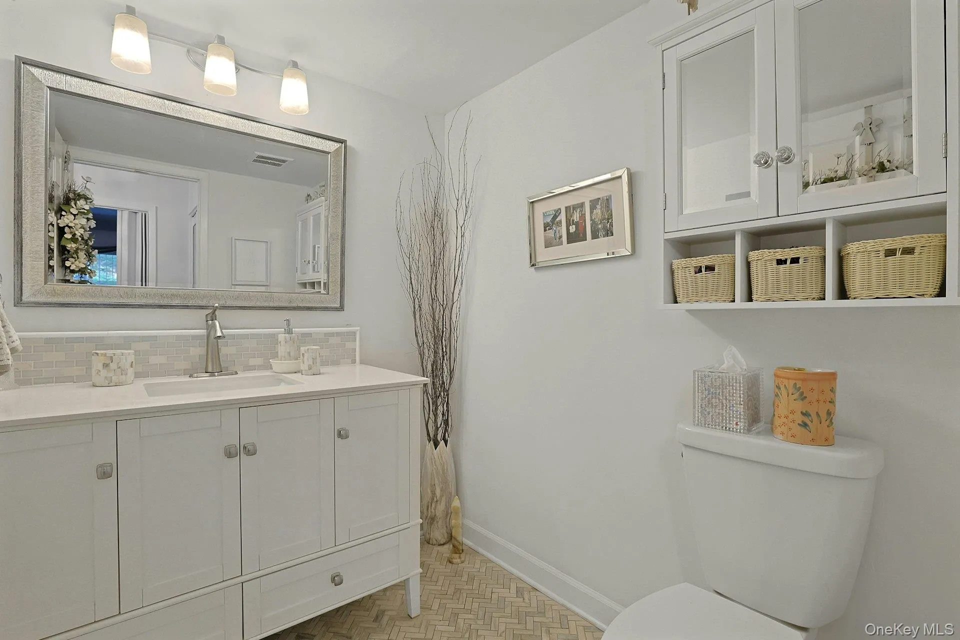 This is the Powder room on the first floor. When entertaining, it makes it easier for your guests to use this Bathroom rather than go upstairs to the bedroom areas. This is the Powder room on the first floor. When entertaining, it makes it easier for your guests to use this Bathroom rather than go upstairs to the bedroom areas.