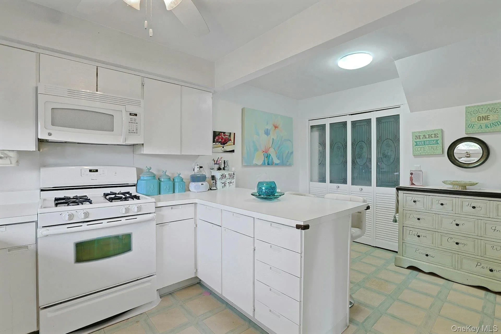 The doors here in the Kitchen go to the Laundry area which offers additional storage space as well. The doors here in the Kitchen go to the Laundry area which offers additional storage space as well.