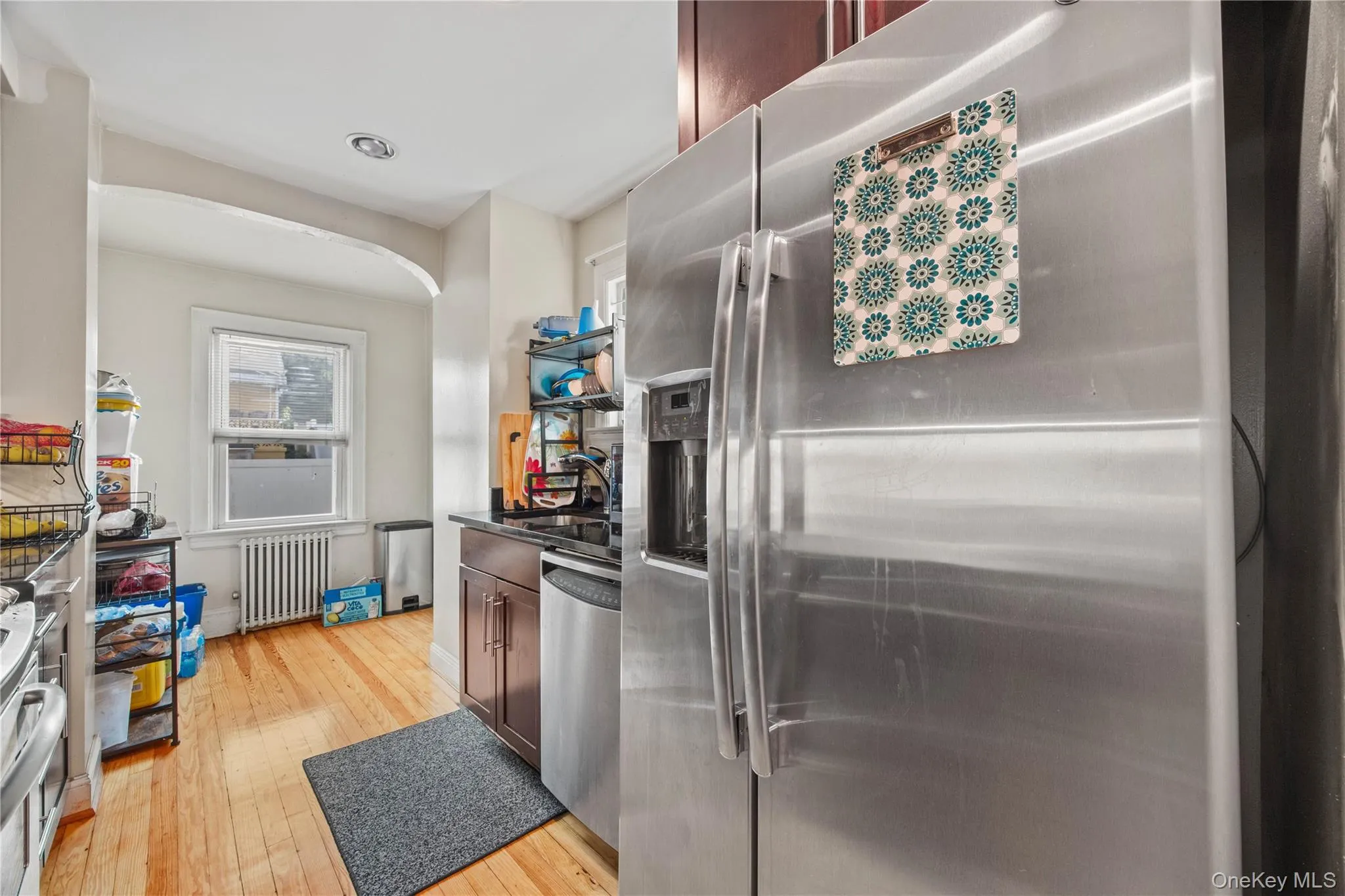 Stainless steel refrigerator with a water and ice dispenser Stainless steel refrigerator with a water and ice dispenser
