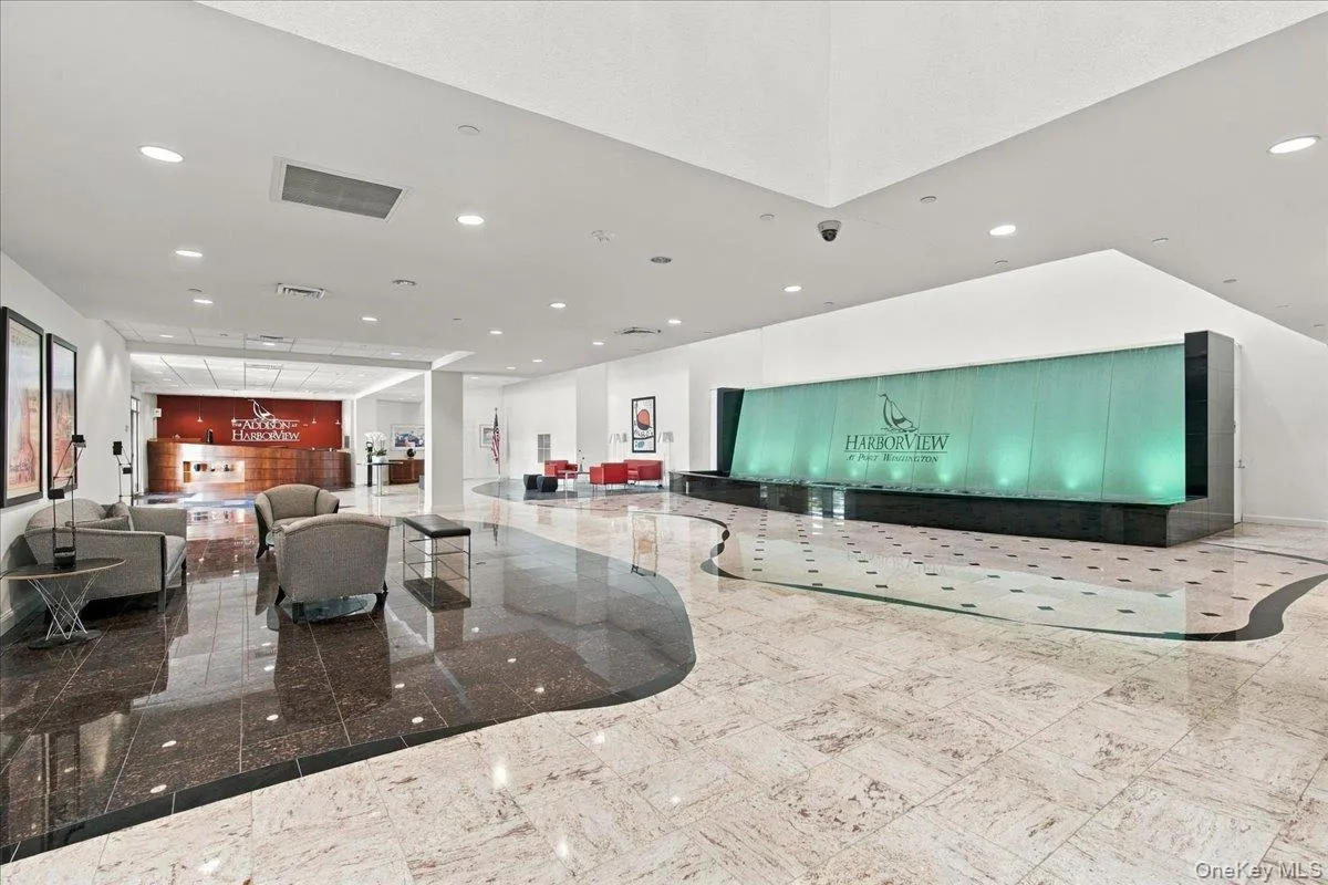 Entrance Foyer with waterfall and marble floors Entrance Foyer with waterfall and marble floors