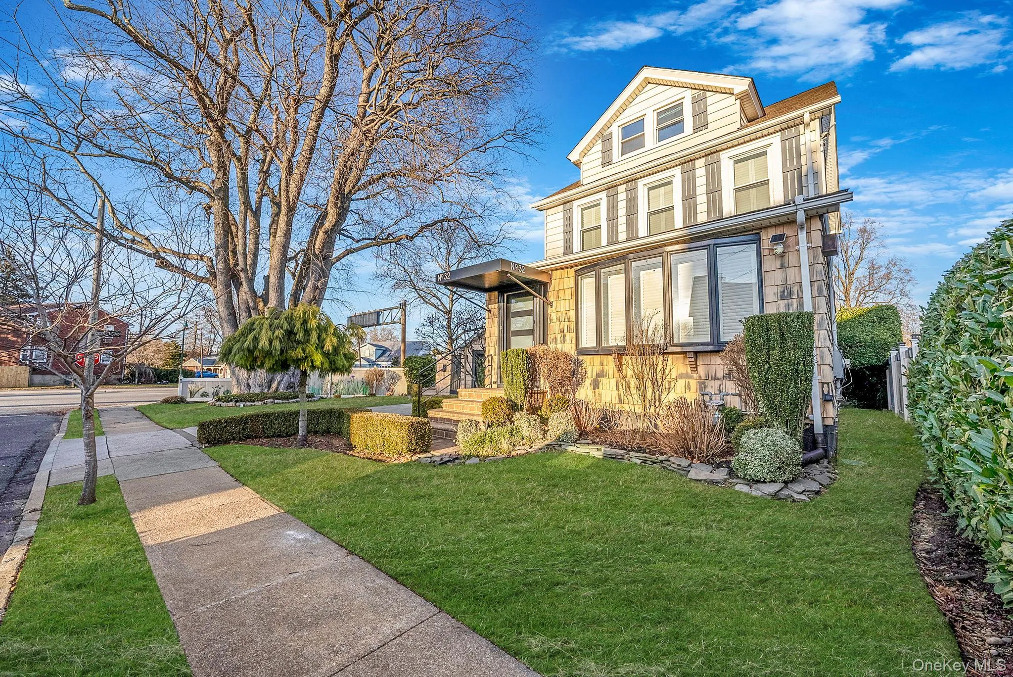 View of front of home featuring a front lawn View of front of home featuring a front lawn