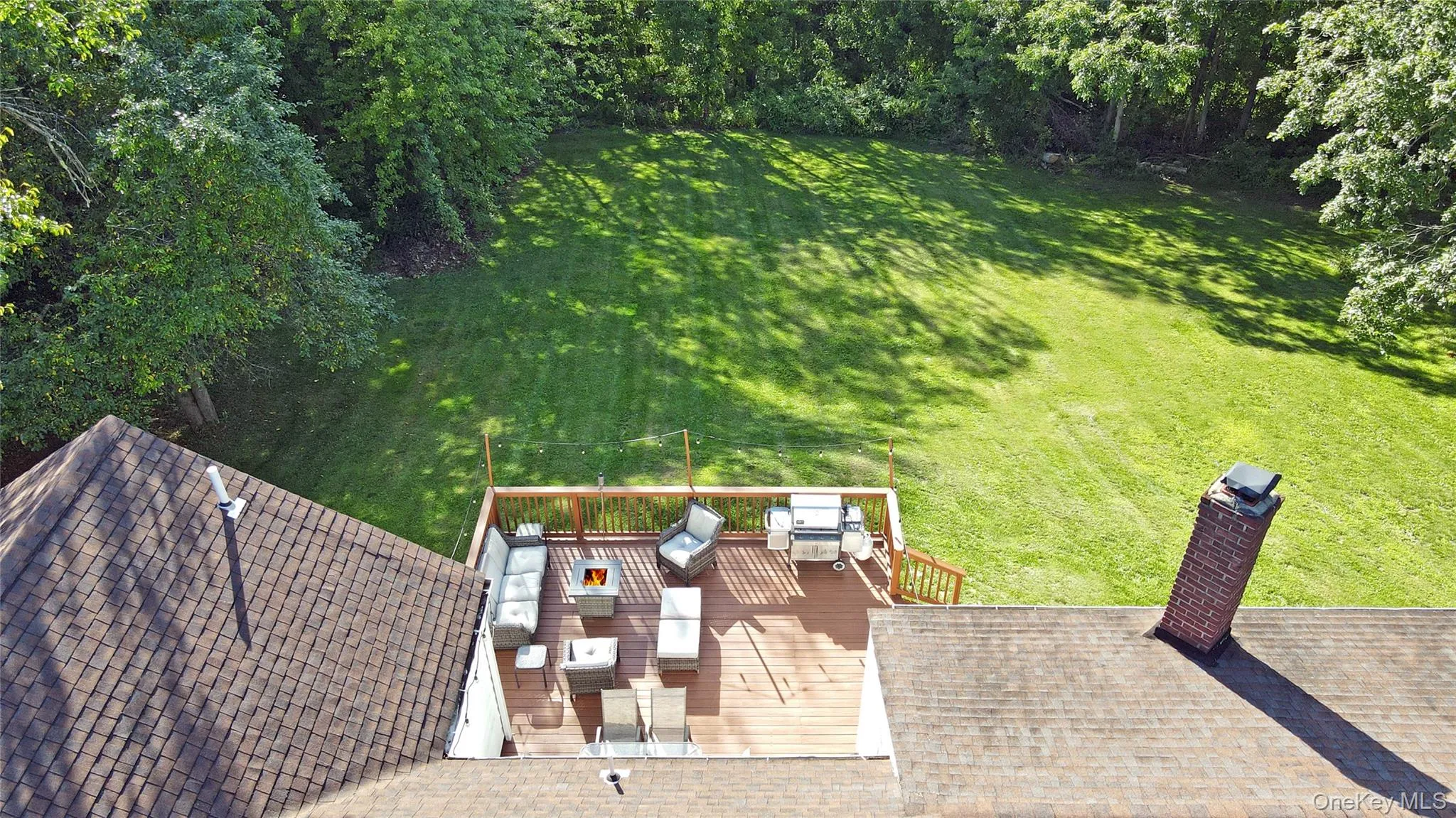 Backyard deck privately treelined. Backyard deck privately treelined.