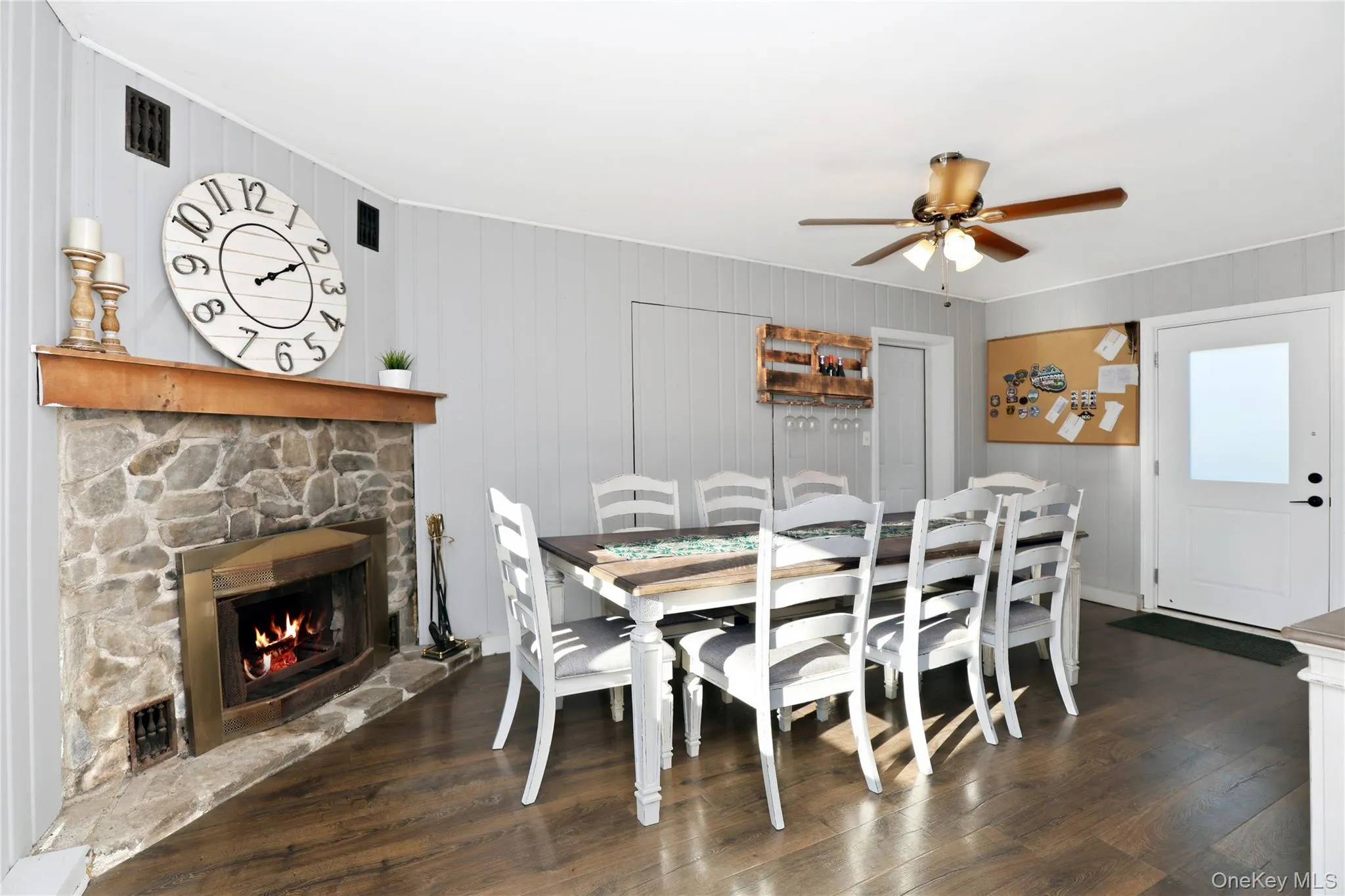 Wood fireplace in formal dining room which is versatile to be whatever one prefers. Deck & garage access. Wood fireplace in formal dining room which is versatile to be whatever one prefers. Deck & garage access.