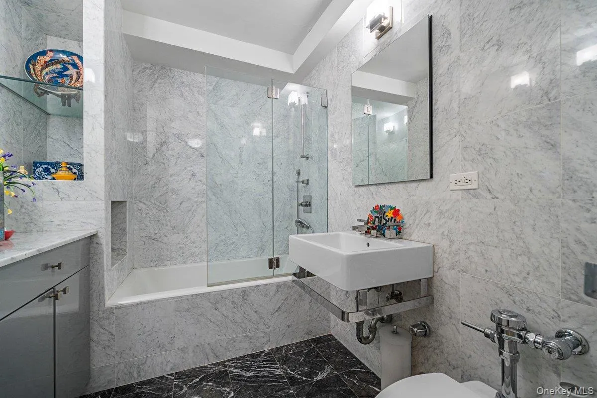 hall bathroom with tub and shower hall bathroom with tub and shower