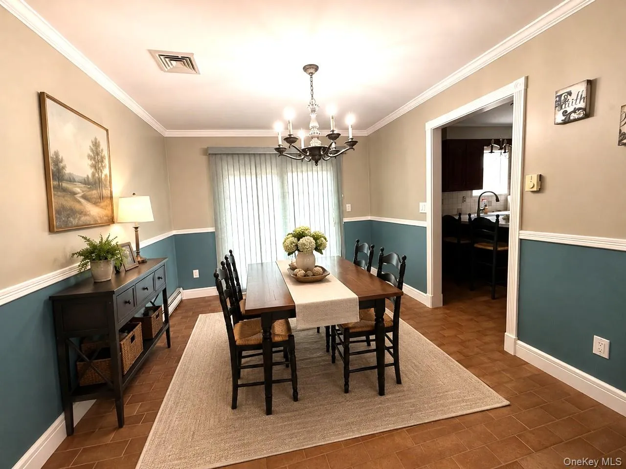 Dining room has tiled floor, Chair rails, Crown molding and SGD to Deck. Dining room has tiled floor, Chair rails, Crown molding and SGD to Deck.