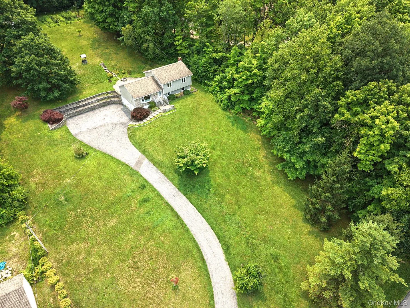 Lush acreage with mature trees. Lush acreage with mature trees.