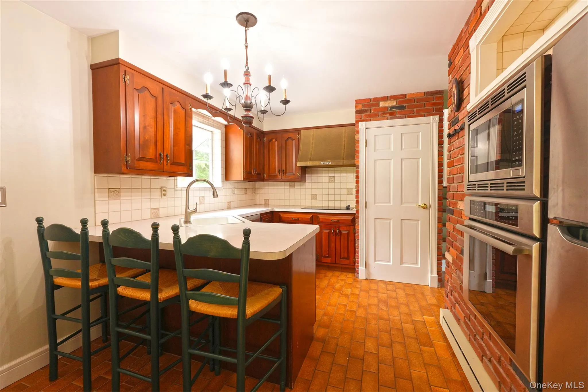 Breakfast Bar in Kitchen and tiled floor Breakfast Bar in Kitchen and tiled floor