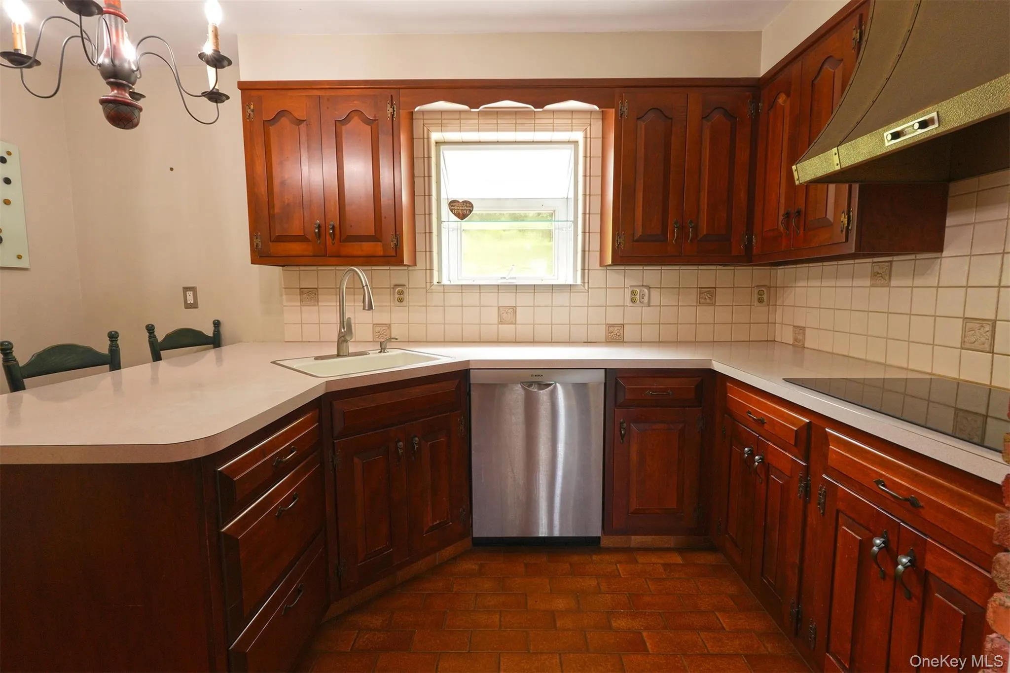 Great garden window in kitchen for growing your own herbs or pretty flowers. Great garden window in kitchen for growing your own herbs or pretty flowers.