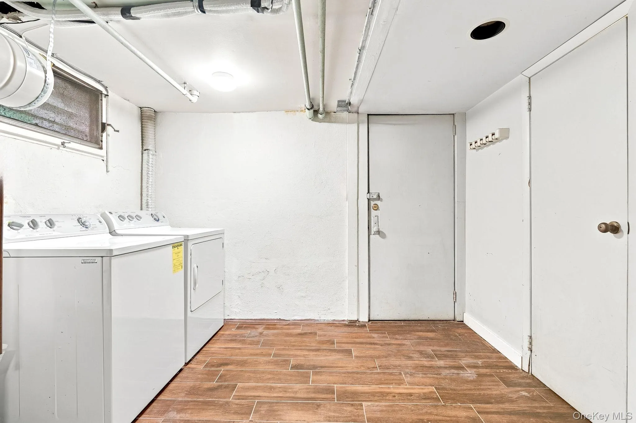Lower Level Laundry and Utilities Lower Level Laundry and Utilities