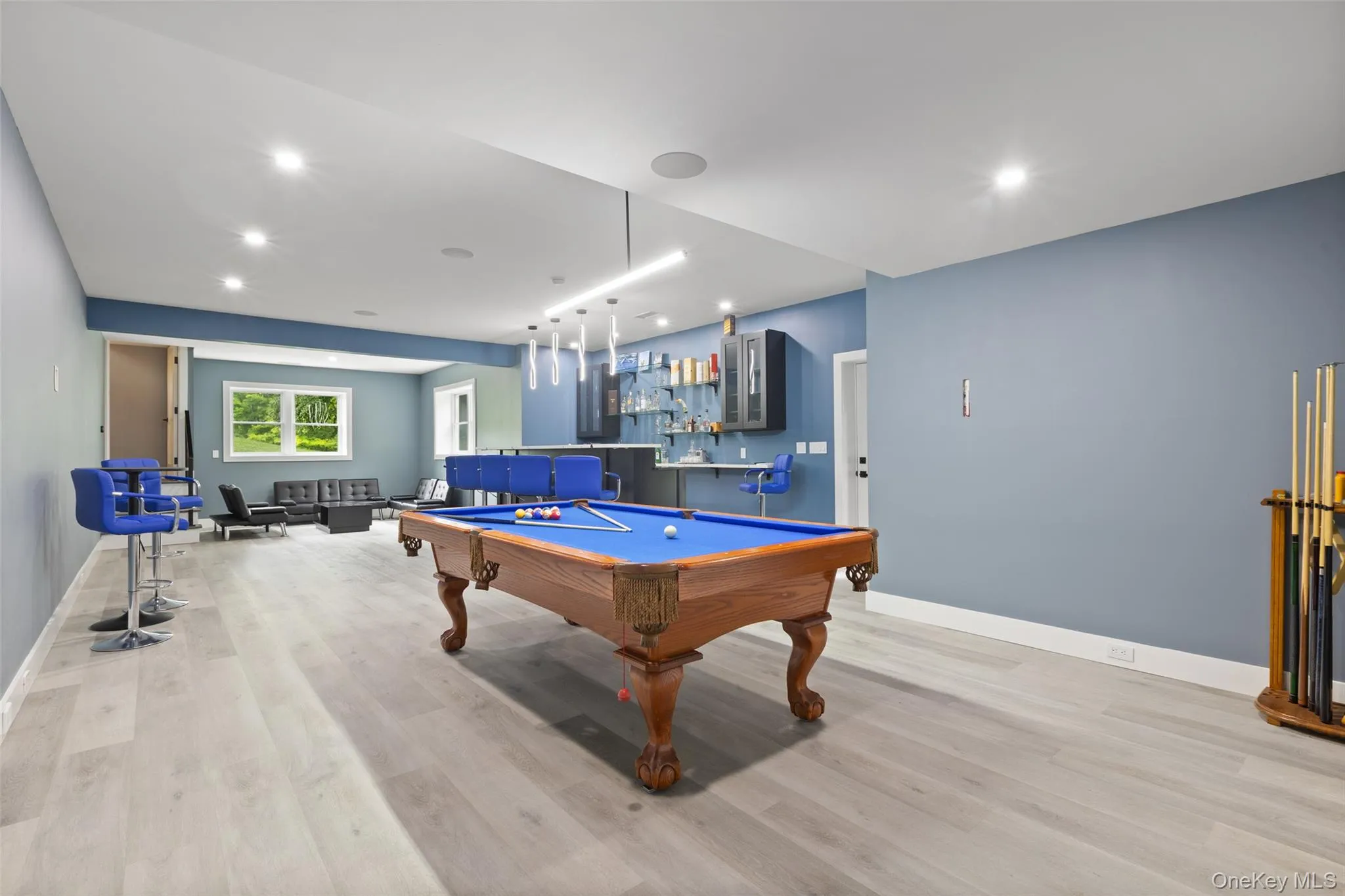 Finished Basement with a lounge area and billiards table Finished Basement with a lounge area and billiards table