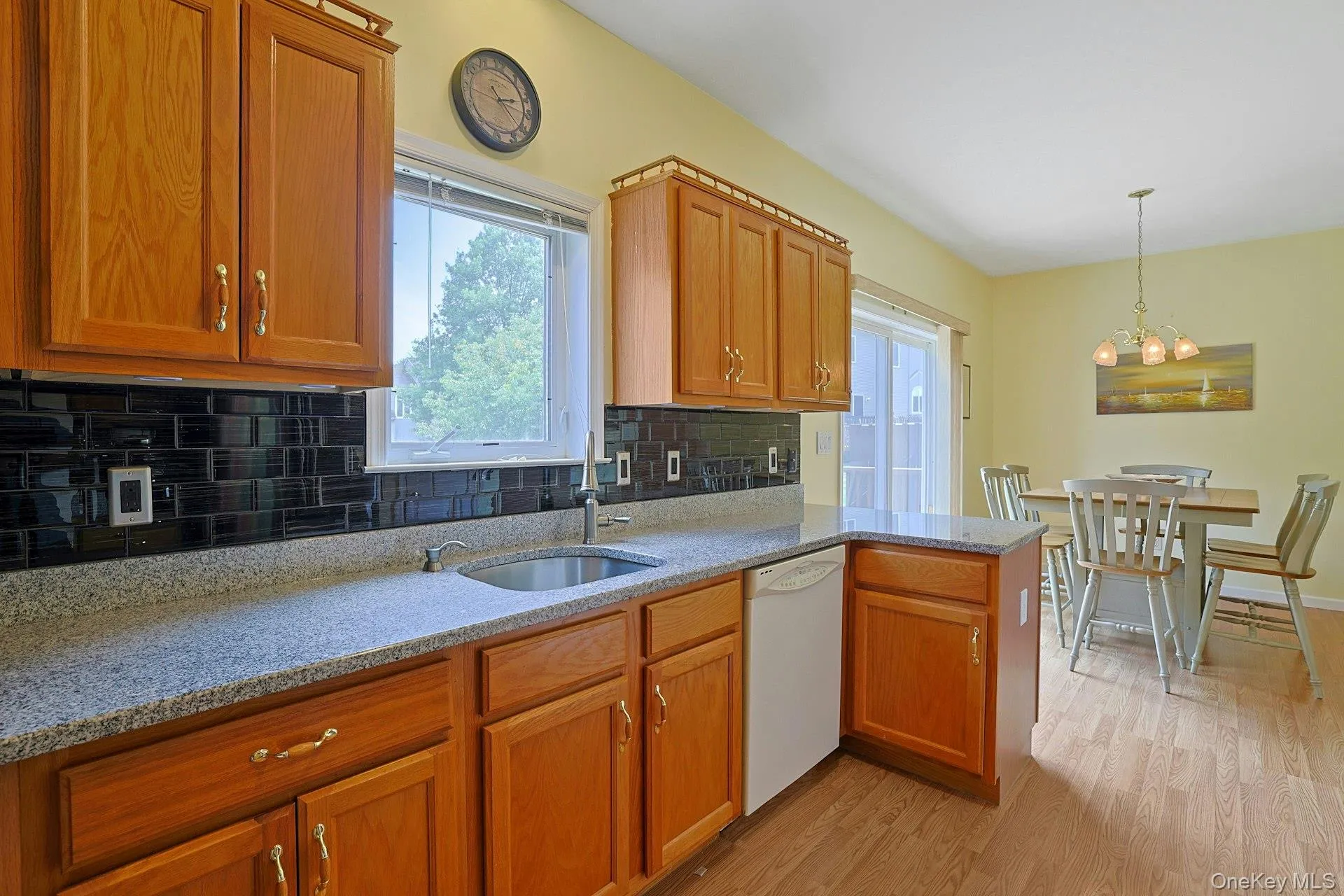 Eat-in kitchen with generous space for a dining table and chairs, perfect for everyday meals. Eat-in kitchen with generous space for a dining table and chairs, perfect for everyday meals.