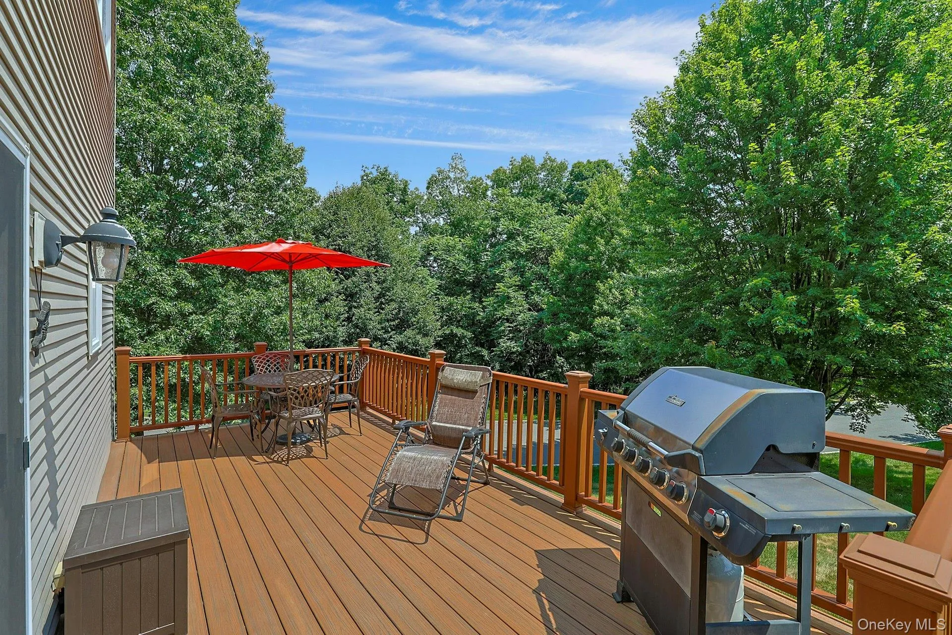 Enjoy outdoor living on the large deck with room for seating, dining, and gatherings. Enjoy outdoor living on the large deck with room for seating, dining, and gatherings.